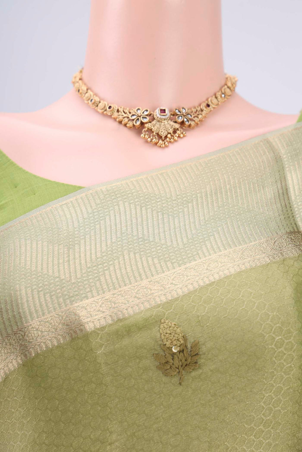 Border image of Pista Green Mysore Georgette Saree with Embroidery on the body and Zari Border. 