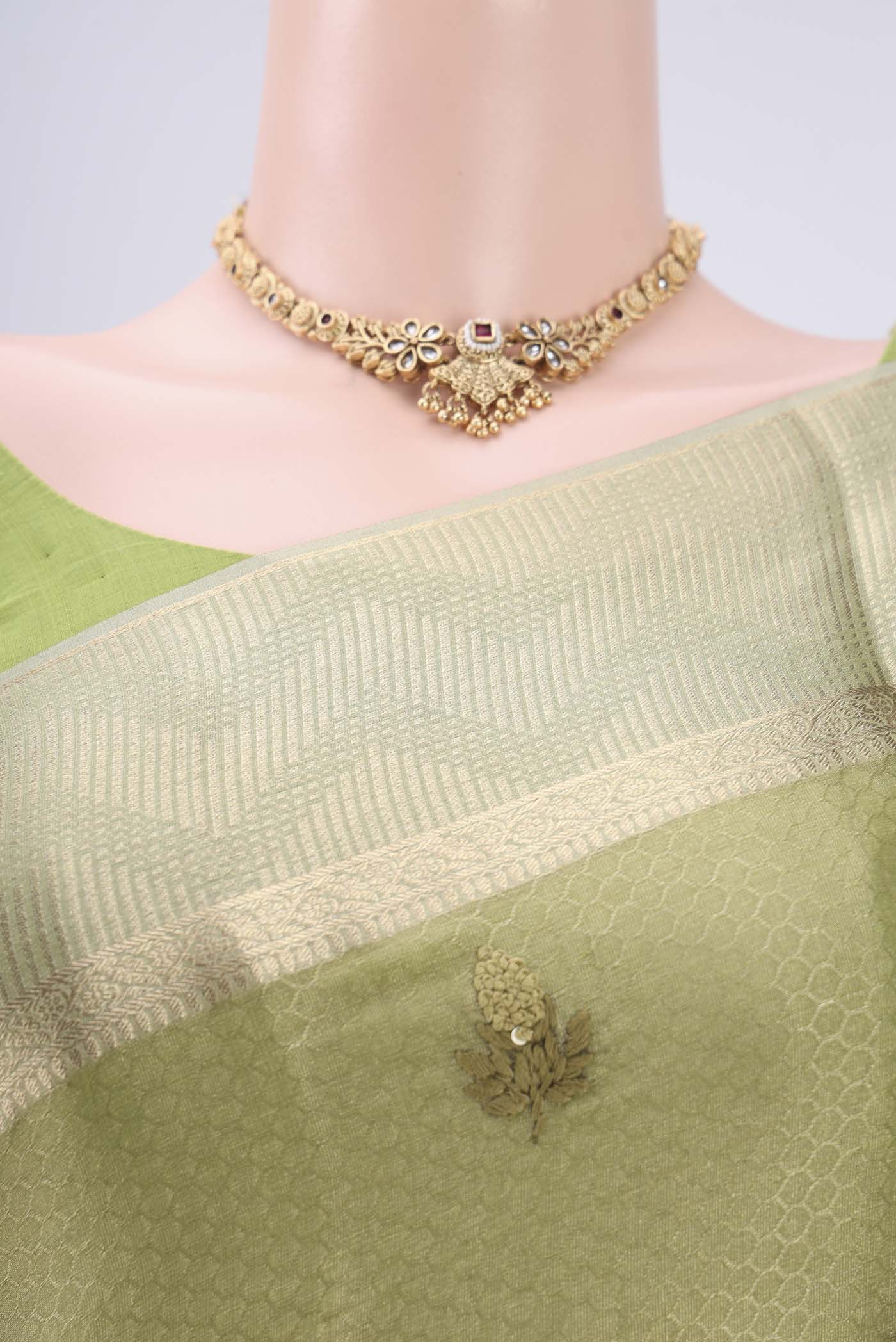 Border image of Pista Green Mysore Georgette Saree with Embroidery on the body and Zari Border. 
