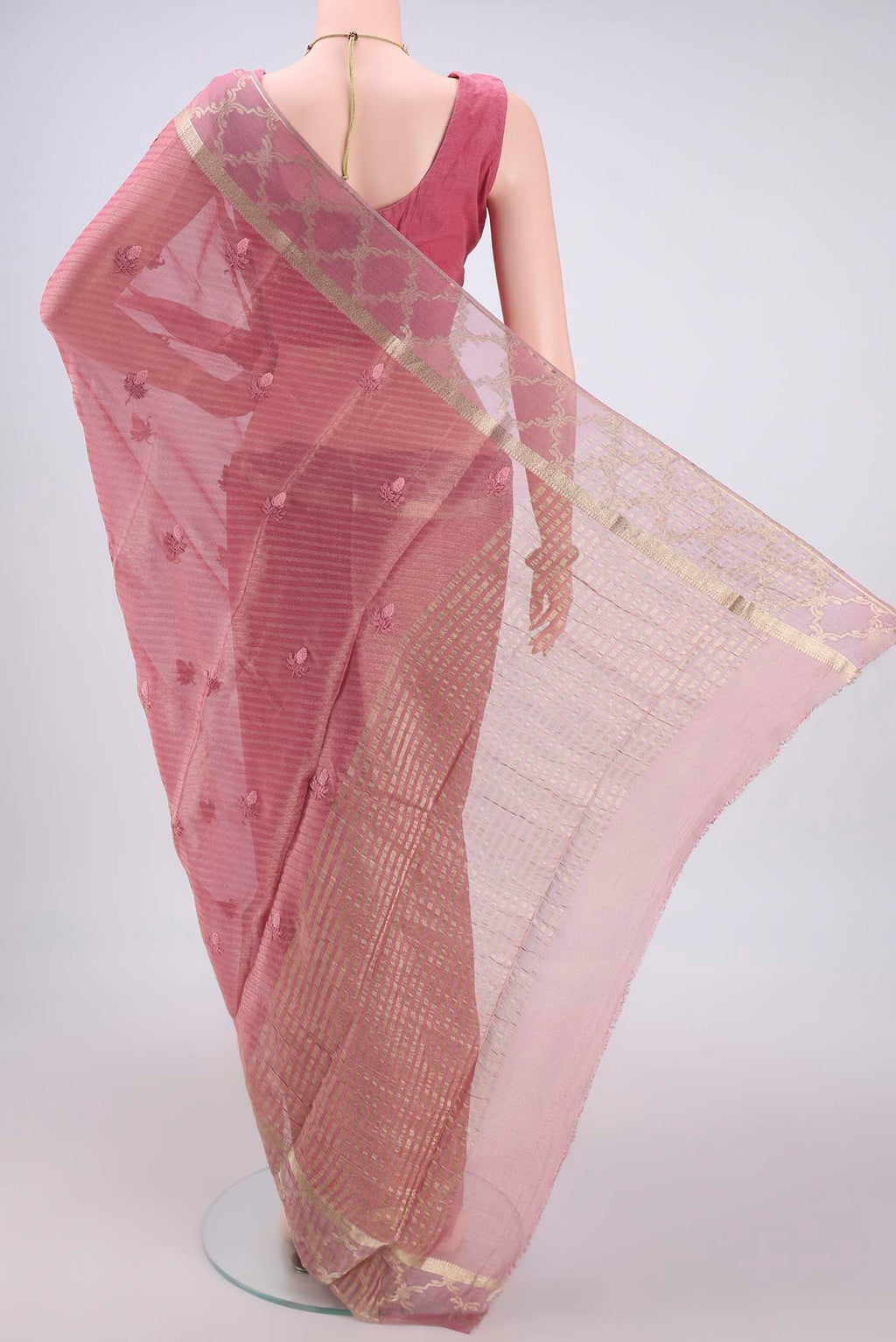 Flat view of Rose Gold Mysore Georgette Saree with Embroidery on the body and Zari Border. 