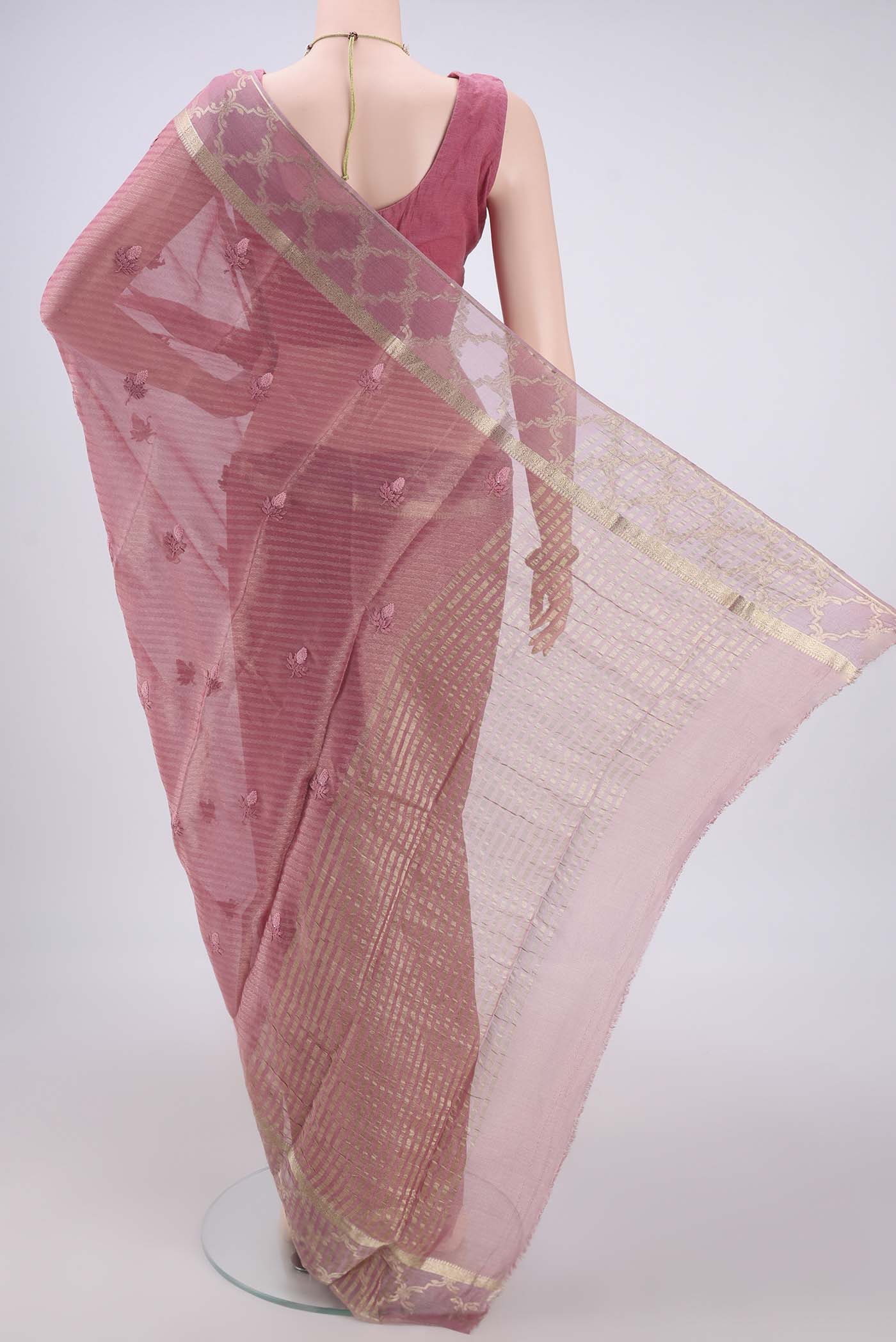 Flat view of Rose Gold Mysore Georgette Saree with Embroidery on the body and Zari Border. 