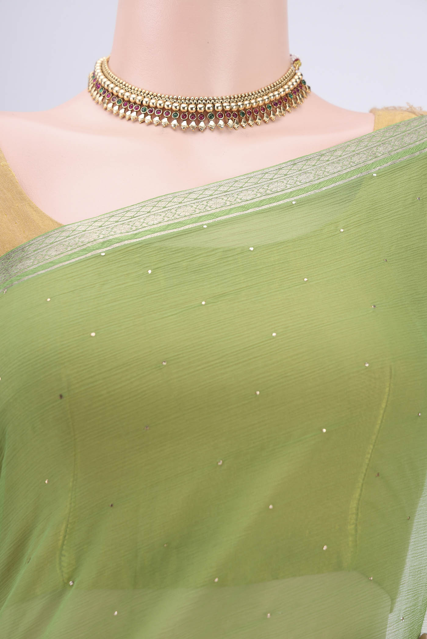 Border image of Light Green Dual Tone Mysore Chiffon Saree with Embroidery on the body and Zari Border. 