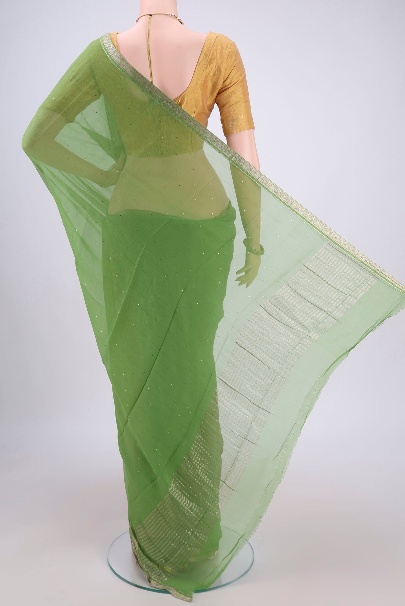 Flat view of Light Green Dual Tone Mysore Chiffon Saree with Embroidery on the body and Zari Border. 