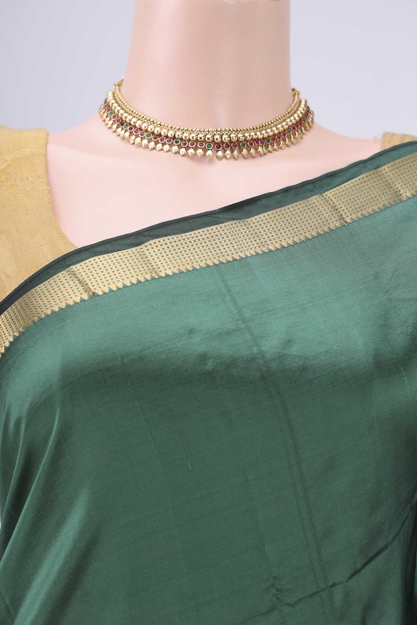 Border image of Sea Green Dual Tone Blended Bangalore Silk Saree with Plain Body and Zari Border. 