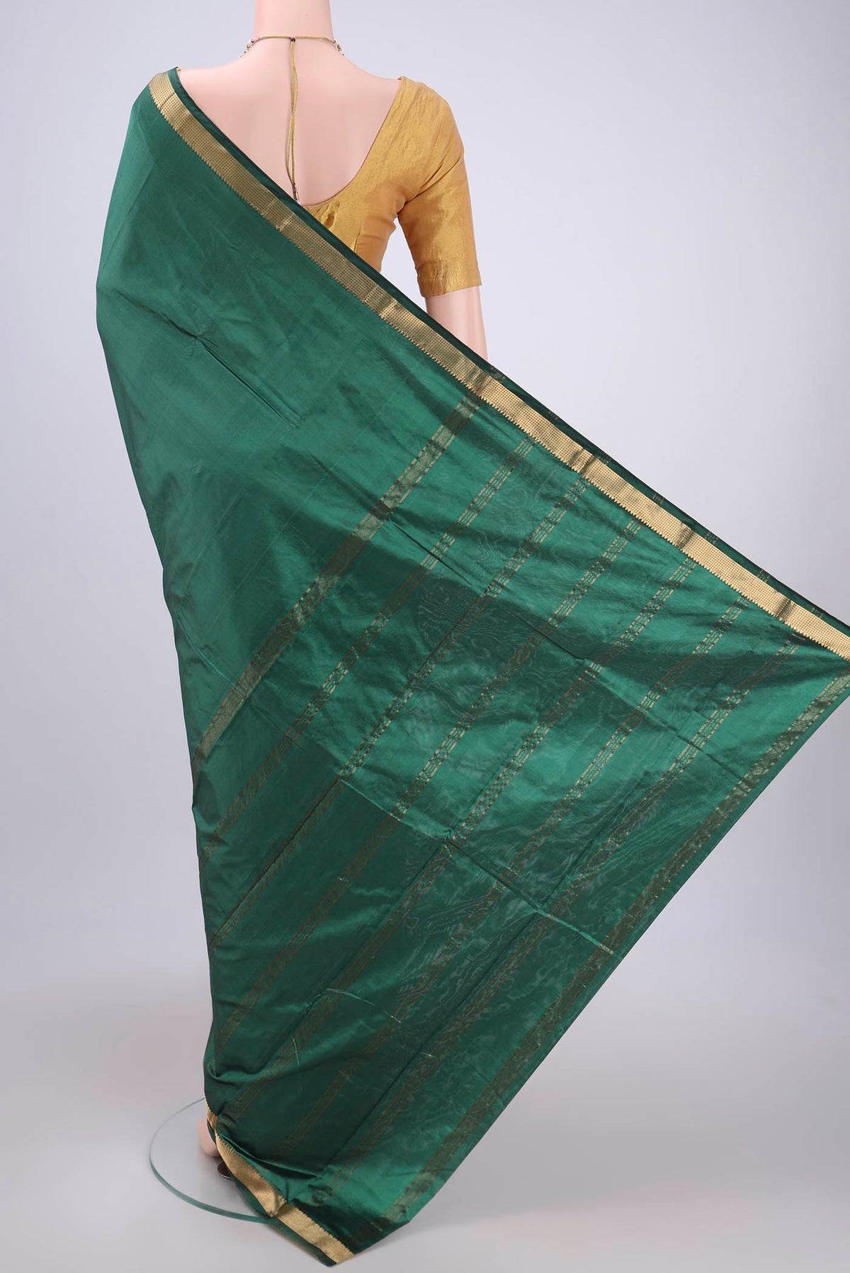 Flat view of Sea Green Dual Tone Blended Bangalore Silk Saree with Plain Body and Zari Border. 