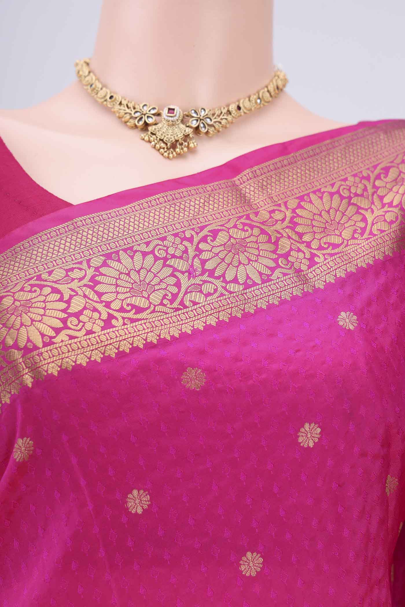 Border image of Rani Pink Dual Tone Blended Bangalore Silk Saree with Jacquard With Zari Butta on the body and Zari Border. 