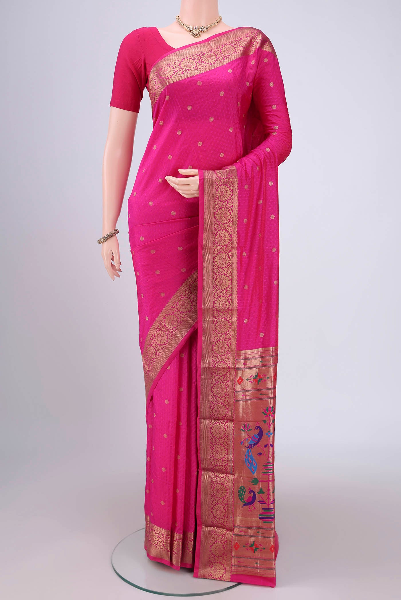 Rani Pink Dual Tone Blended Bangalore Silk Saree with Jacquard With Zari Butta on the body and Zari Border.  displayed on a mannequin