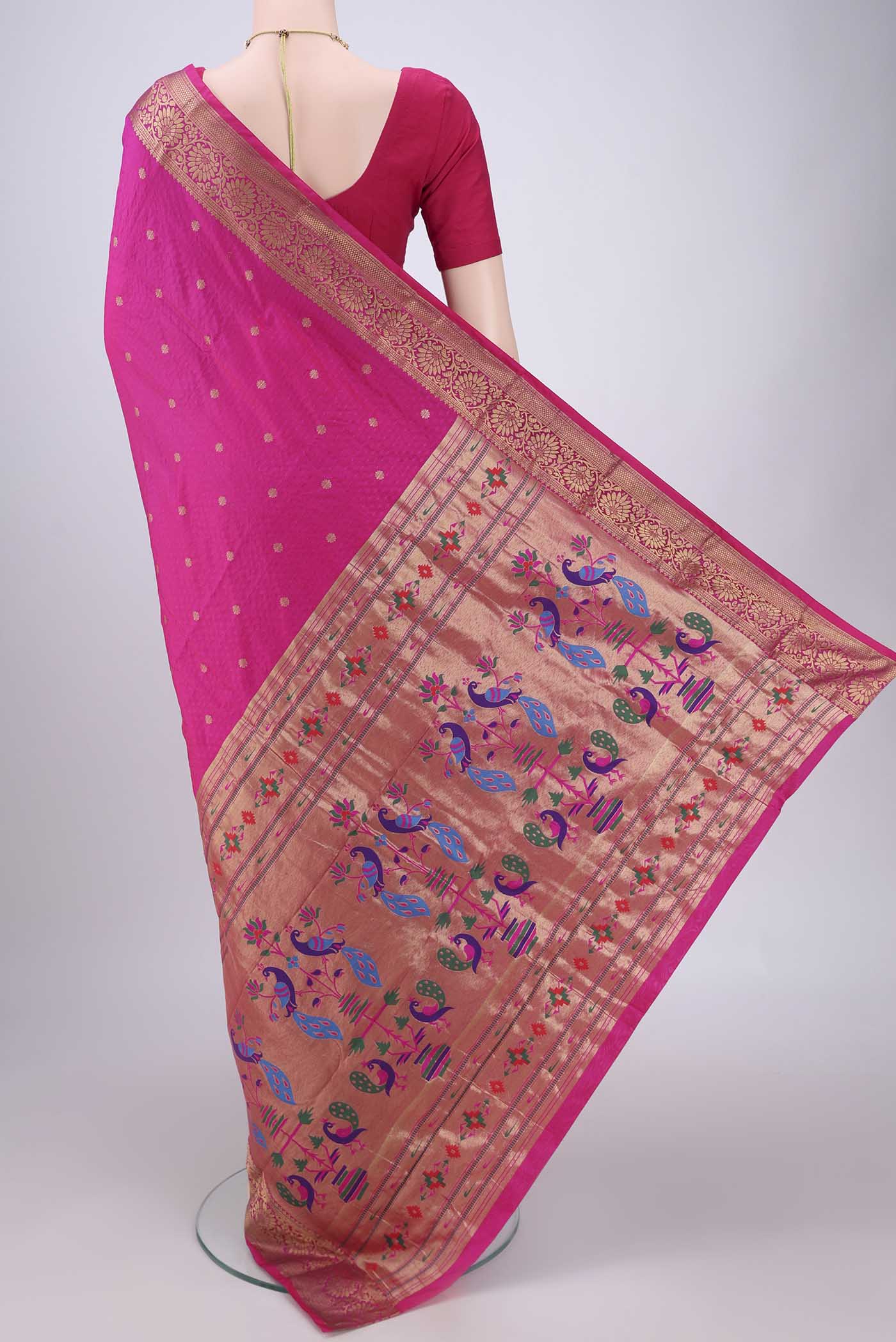 Flat view of Rani Pink Dual Tone Blended Bangalore Silk Saree with Jacquard With Zari Butta on the body and Zari Border. 