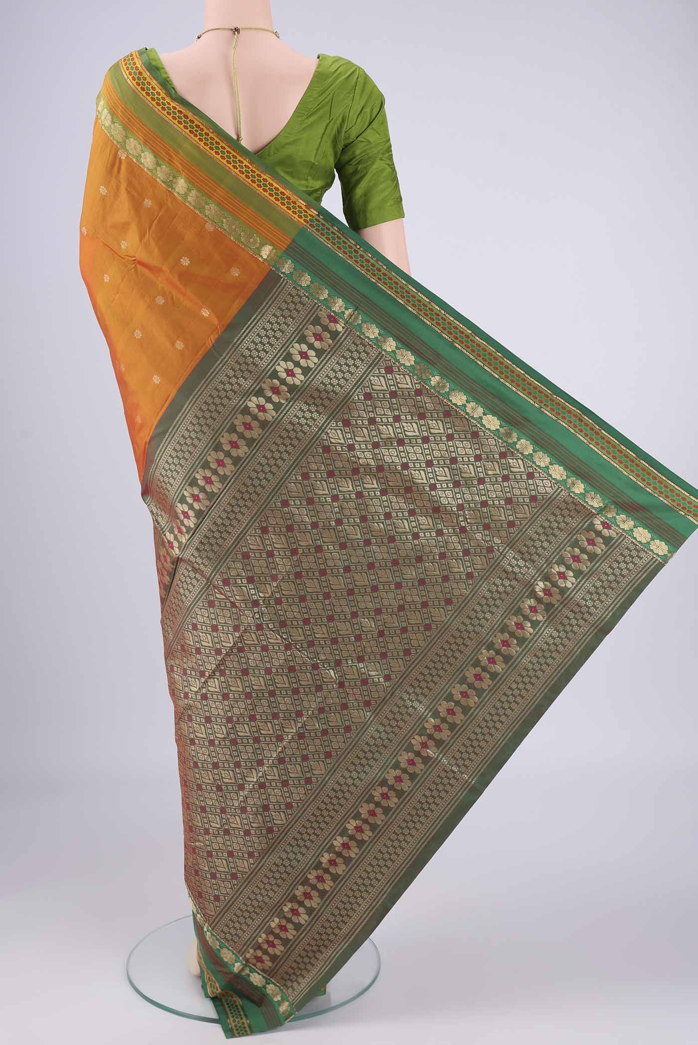 Flat view of Brick Orange Blended Bangalore Silk Saree with Jacquard design on the body and Zari Border. 