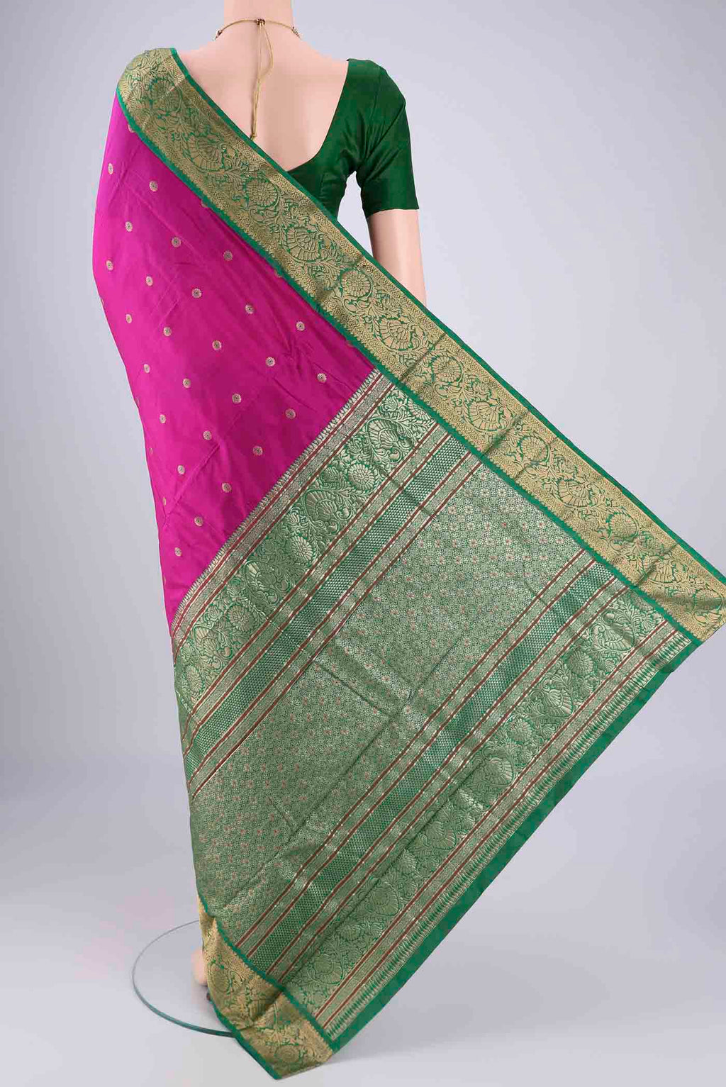 Flat view of Rani Pink Blended Bangalore Silk Saree with Zari And Thread Butta on the body and Zari Border. 