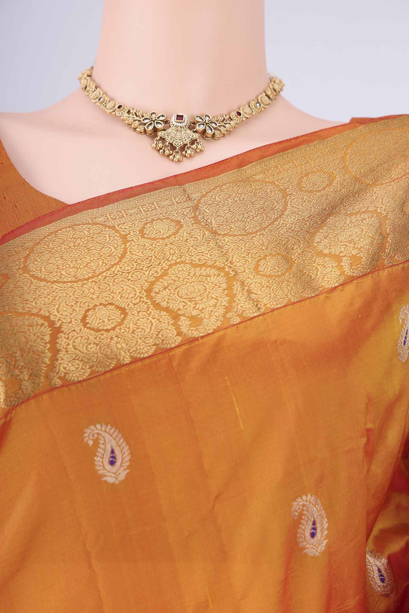 Border image of Orange Dual Tone Blended Bangalore Silk Saree with Zari Butta on the body and Zari Border. 