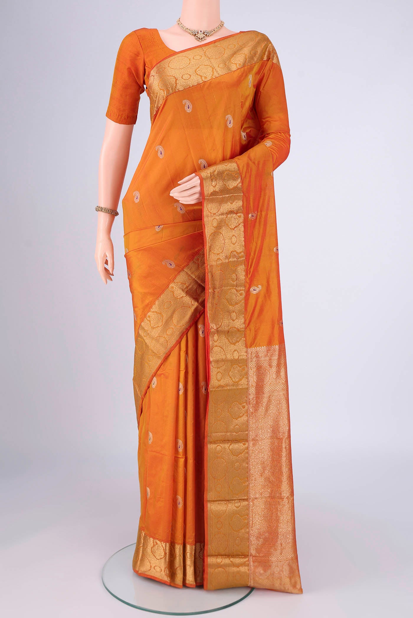 Orange Dual Tone Blended Bangalore Silk Saree with Zari Butta on the body and Zari Border.  displayed on a mannequin