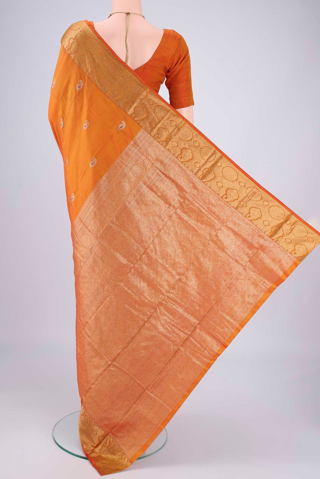 Flat view of Orange Dual Tone Blended Bangalore Silk Saree with Zari Butta on the body and Zari Border. 