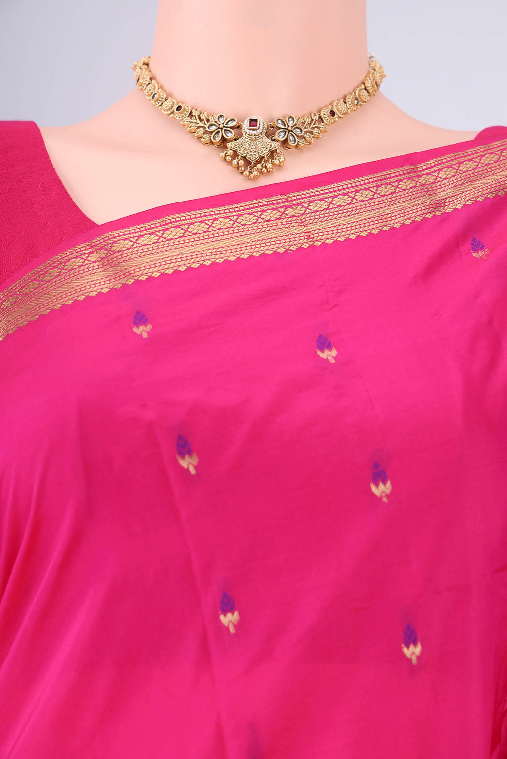 Border image of Rani Pink Blended Bangalore Silk Saree with Zari And Thread Butta on the body and Zari Border. 