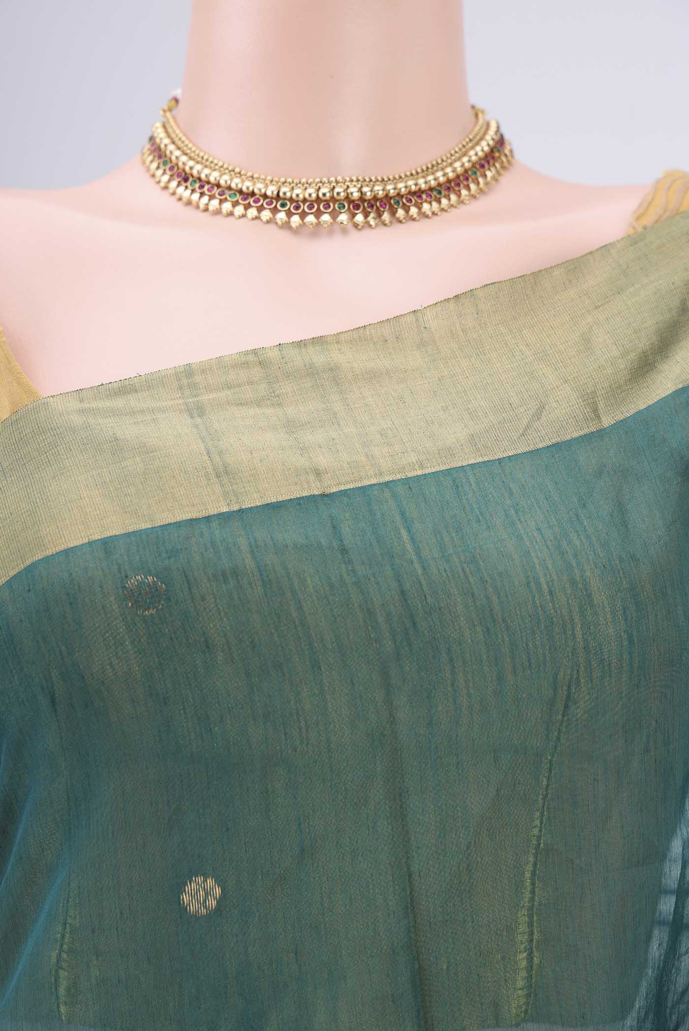 Border image of Green Chanderi Silk Cotton Saree with Zari And Thread Butta on the body and Zari Border. 