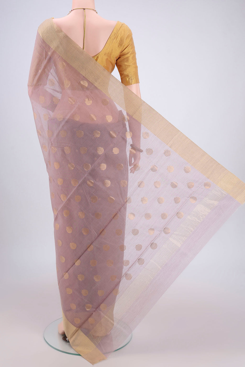 Flat view of Mauve Chanderi Silk Cotton Saree with Zari Butta on the body and Zari Border. 