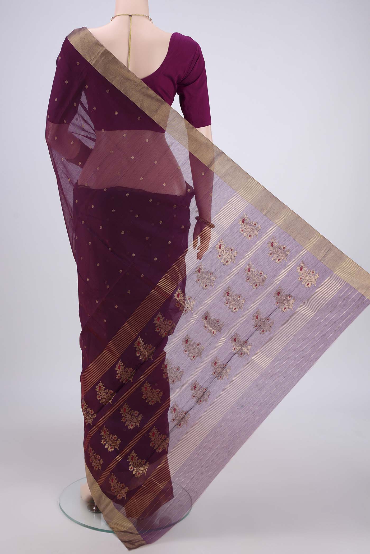 Flat view of Magenta Chanderi Silk Cotton Saree with Zari Butta on the body and Zari Border. 