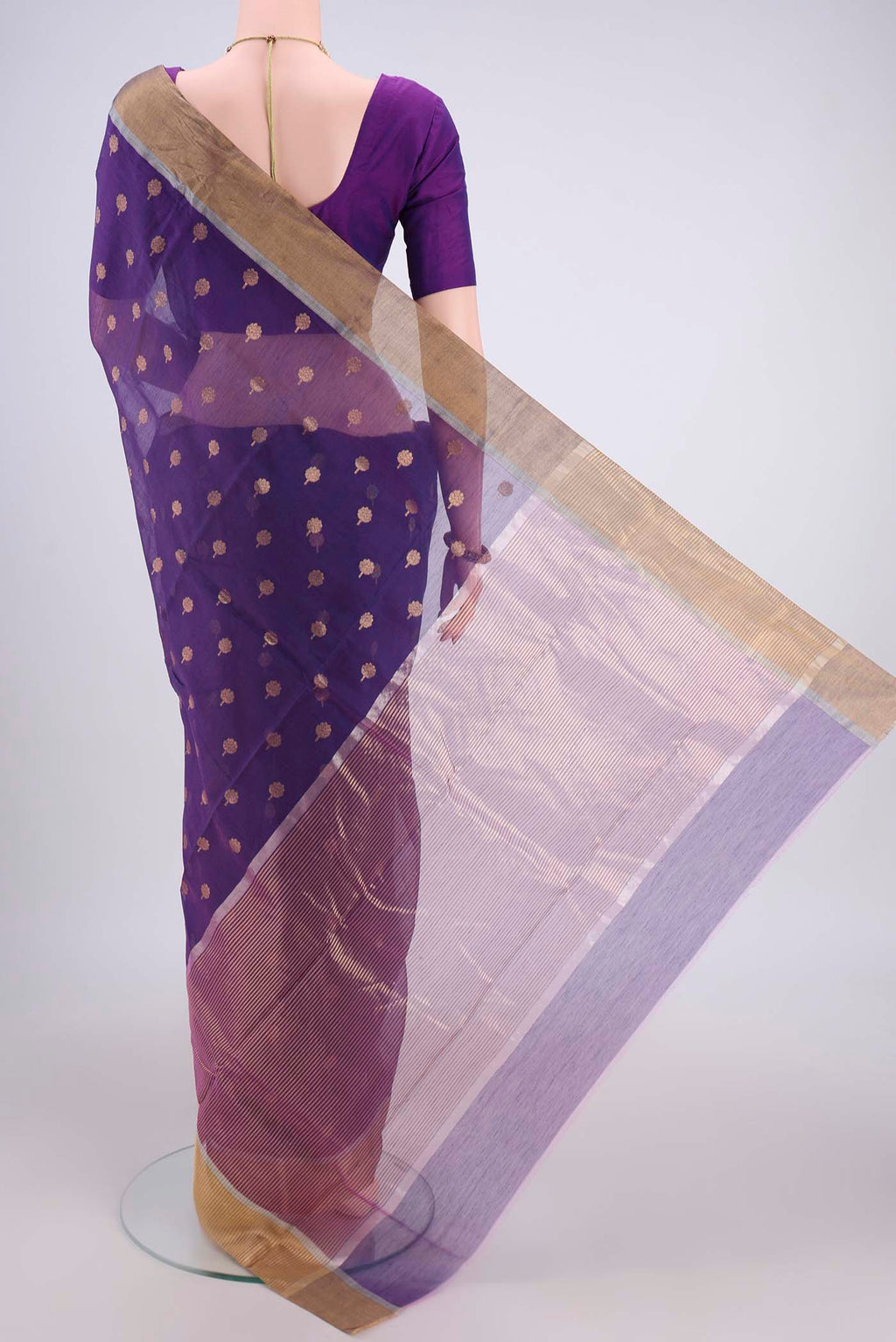 Flat view of Purple Chanderi Silk Cotton Saree with Zari Butta on the body and Zari Border. 