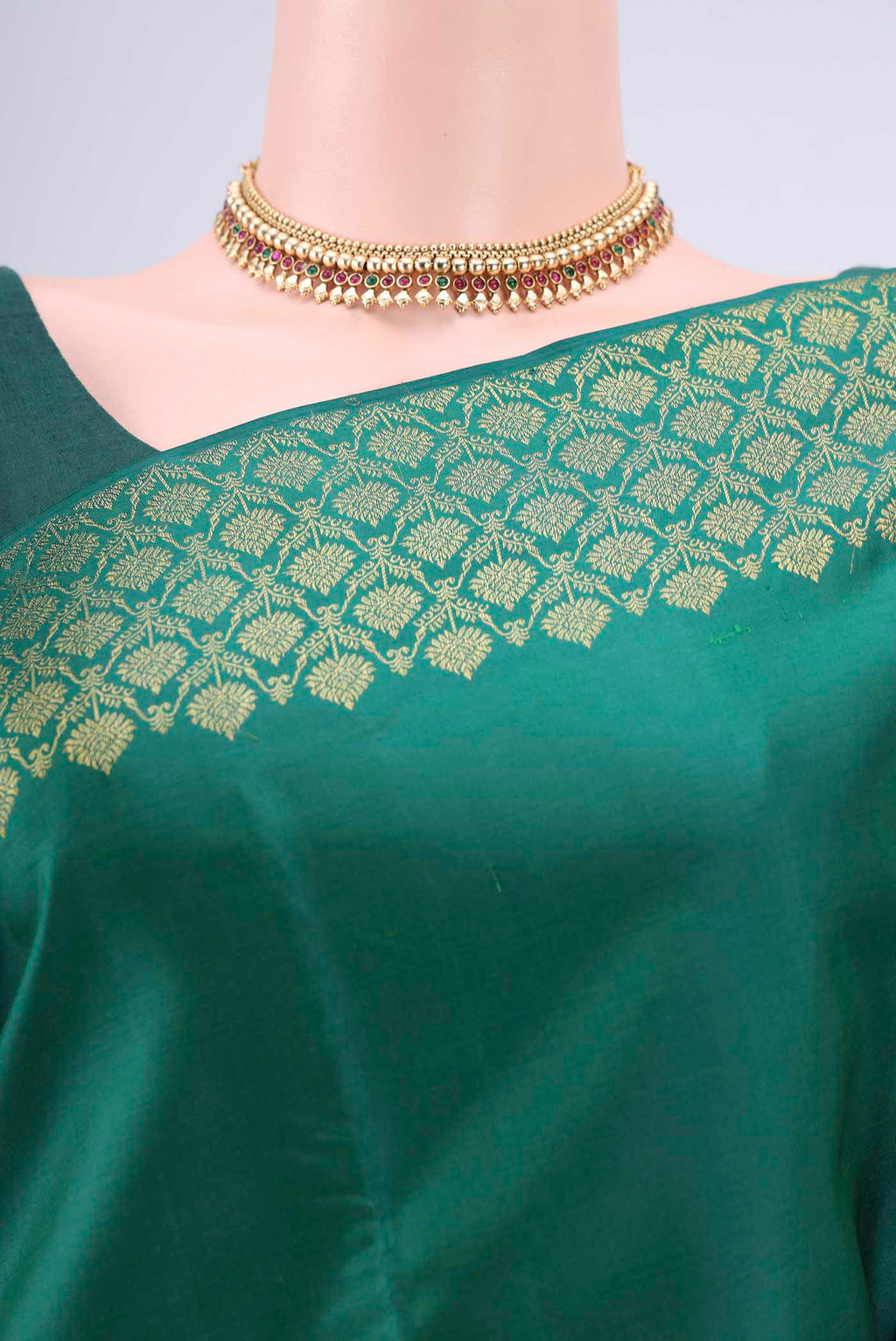 Border image of Bottle Green Kanjivaram Silk Saree with Plain Body and Zari Border. 