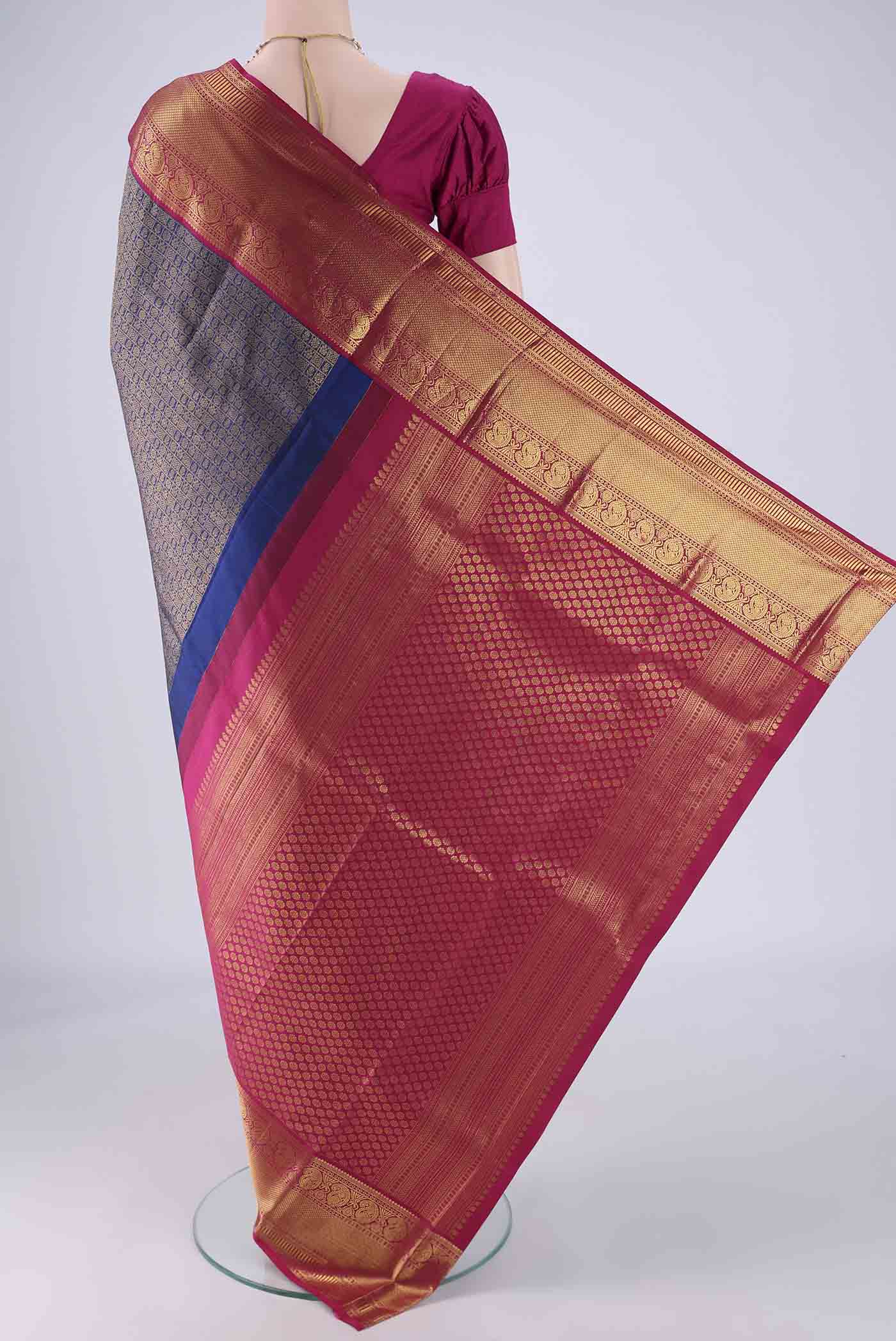Flat view of Blue Kanjivaram Silk Saree with Zari Brocade on the body and Zari Border. 