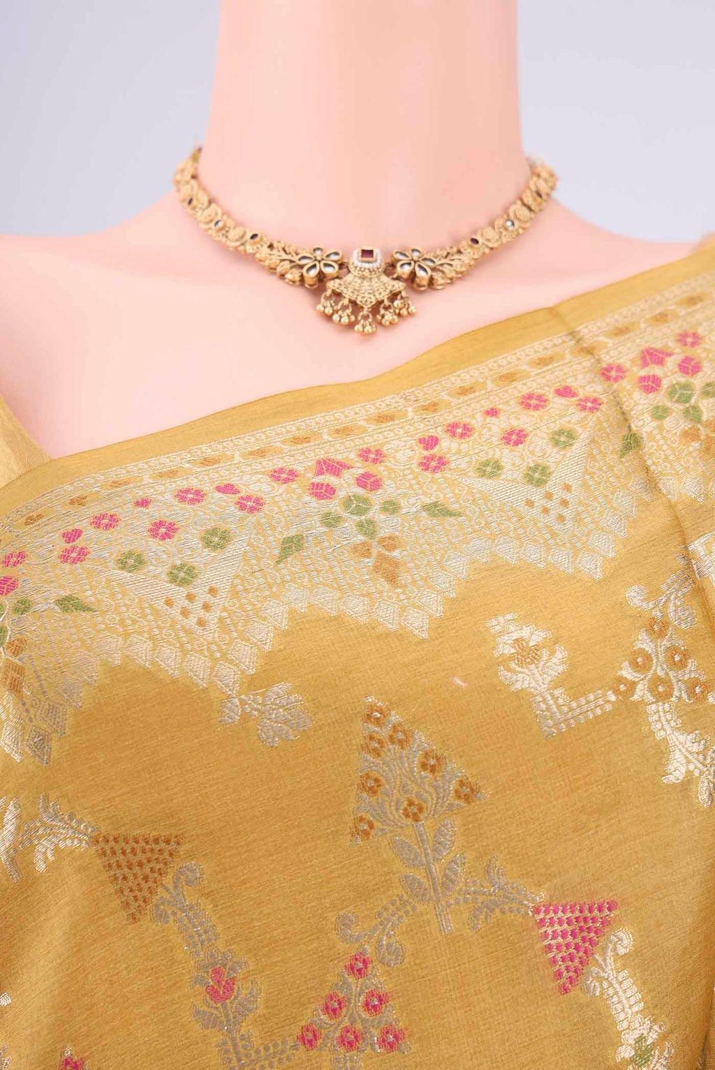 Border image of Yellow Banarasi Tussar Silk Saree with Zari Brocade on the body and Zari And Thread Border. 