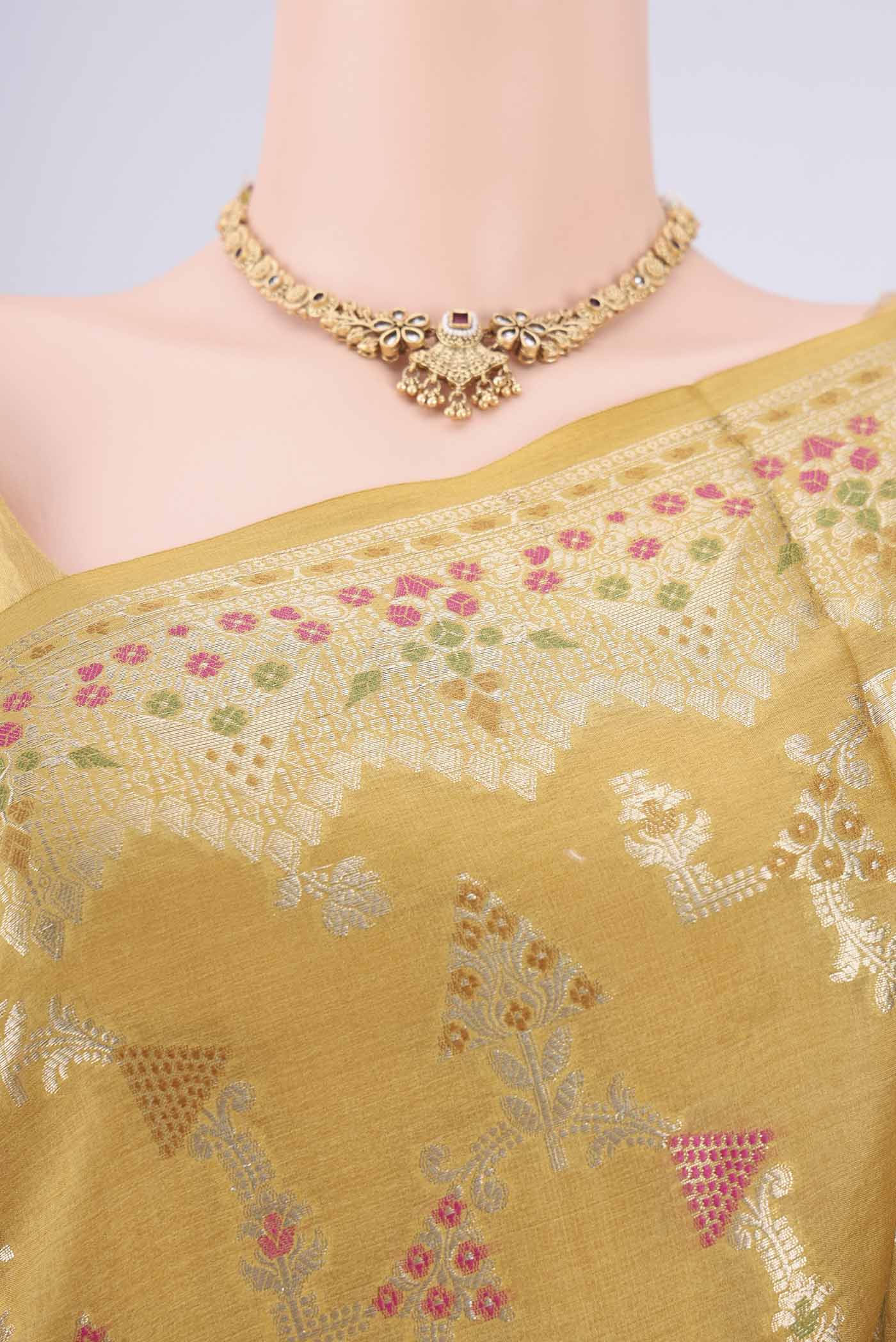 Border image of Yellow Banarasi Tussar Silk Saree with Zari Brocade on the body and Zari And Thread Border. 