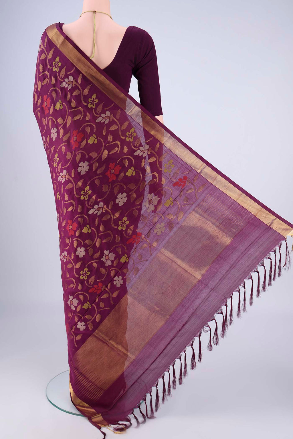 Flat view of Pure Silk Pure Zari Burgundy Uppada Saree with Jamdani on the body and Zari Border. 