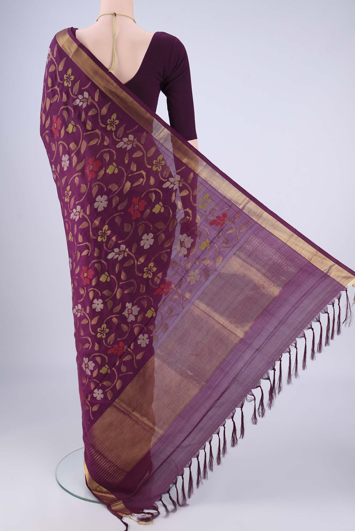 Flat view of Pure Silk Pure Zari Burgundy Uppada Saree with Jamdani on the body and Zari Border. 