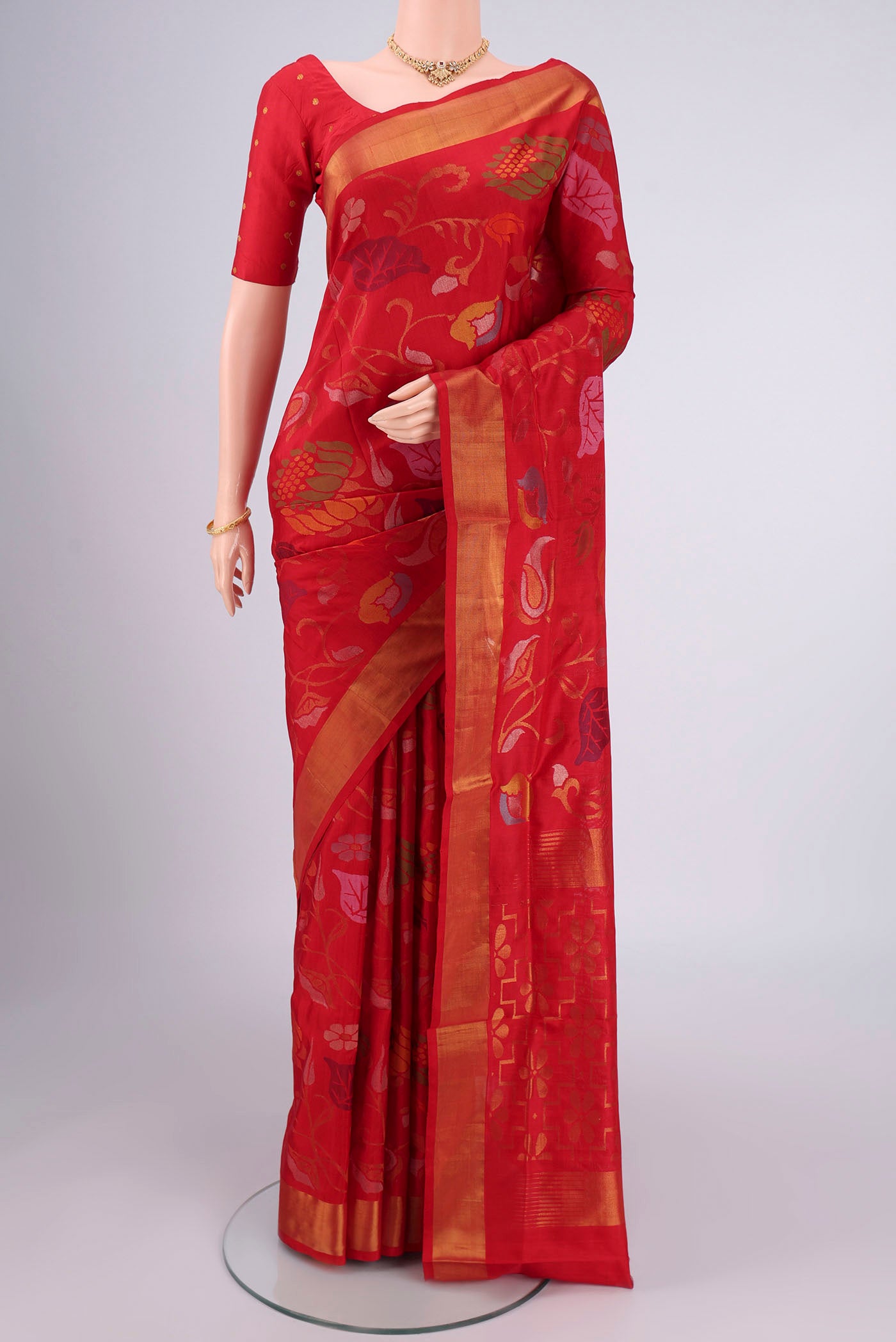 Pure Silk Pure Zari Red Uppada Saree with Jamdani on the body and Zari Border.  displayed on a mannequin