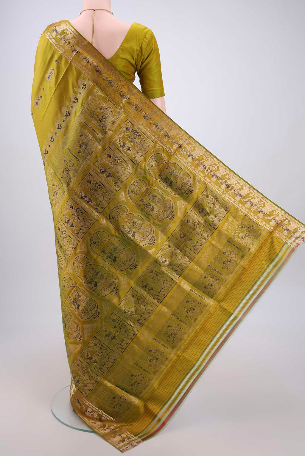 Flat view of Acid Green Baluchari Silk Saree with Zari And Thread Butta on the body and Zari And Thread Border. 