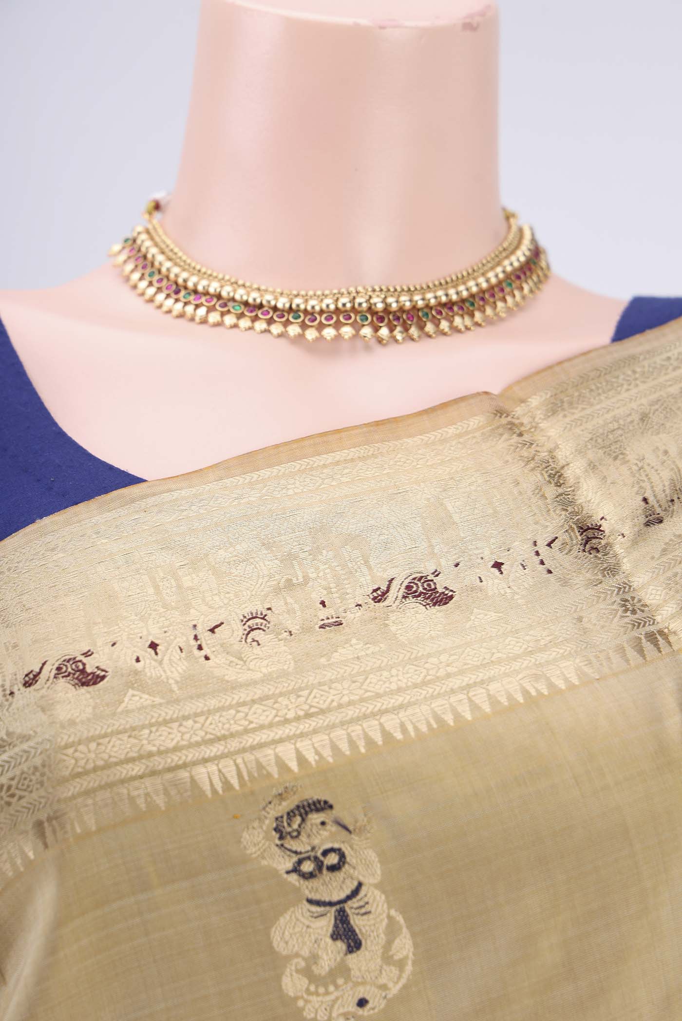 Border image of Beige Baluchari Silk Saree with Zari And Thread Butta on the body and Zari And Thread Border. 