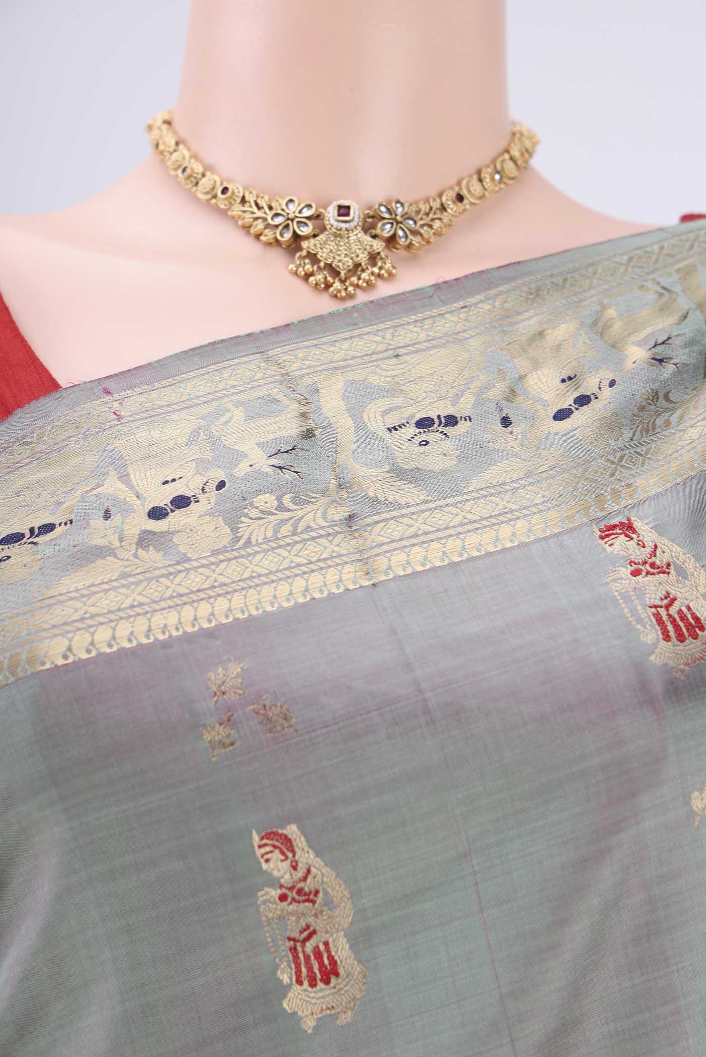 Border image of Grey Dual Tone Baluchari Silk Saree with Zari And Thread Butta on the body and Zari And Thread Border. 