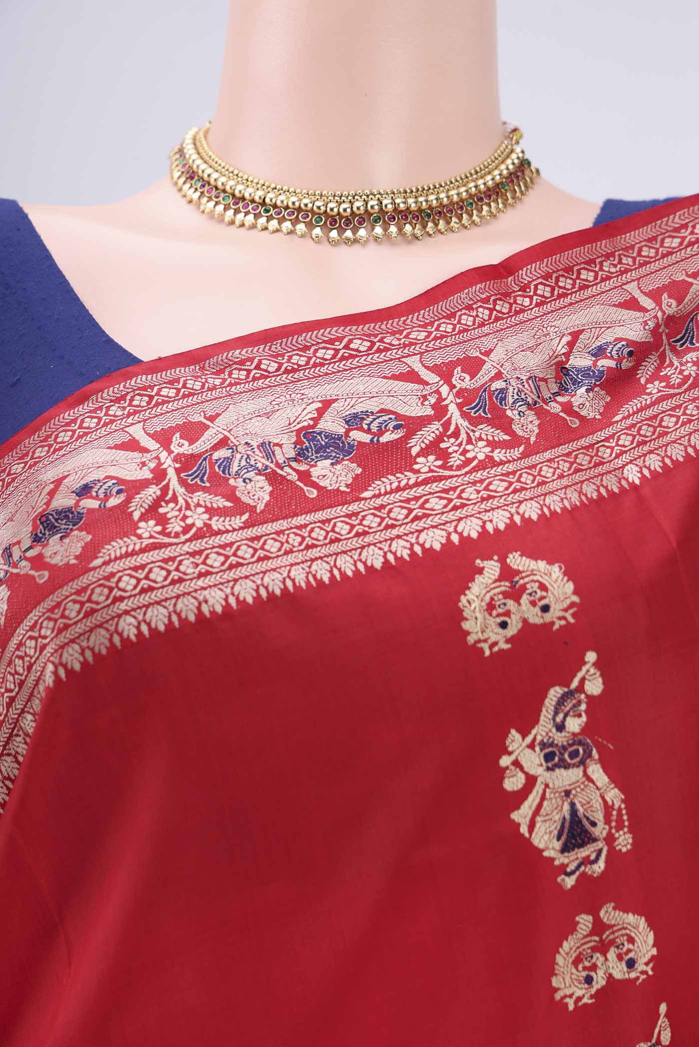 Border image of Red Baluchari Silk Saree with Thread Butta on the body and Thread Border. 