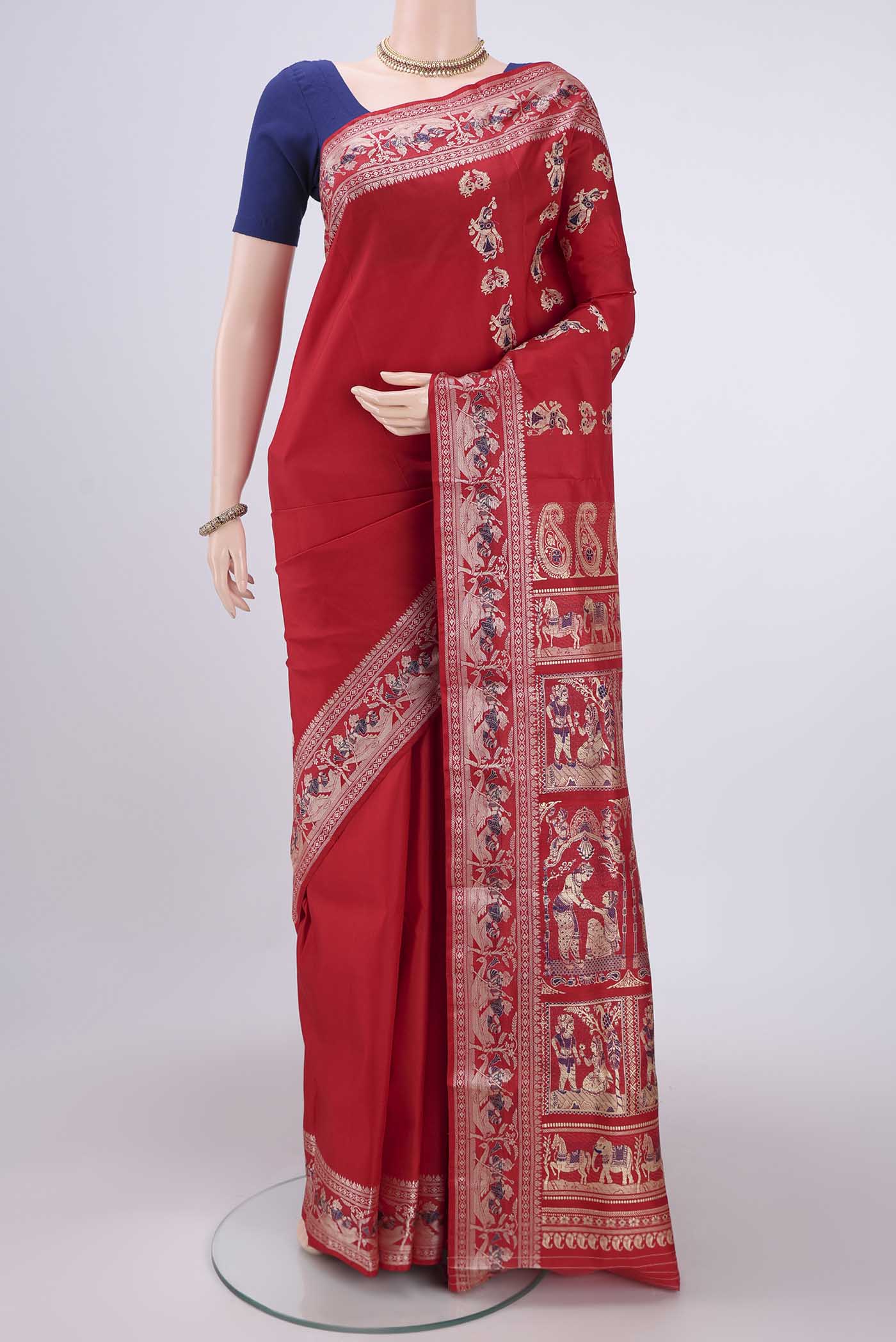 Red Baluchari Silk Saree with Thread Butta on the body and Thread Border.  displayed on a mannequin
