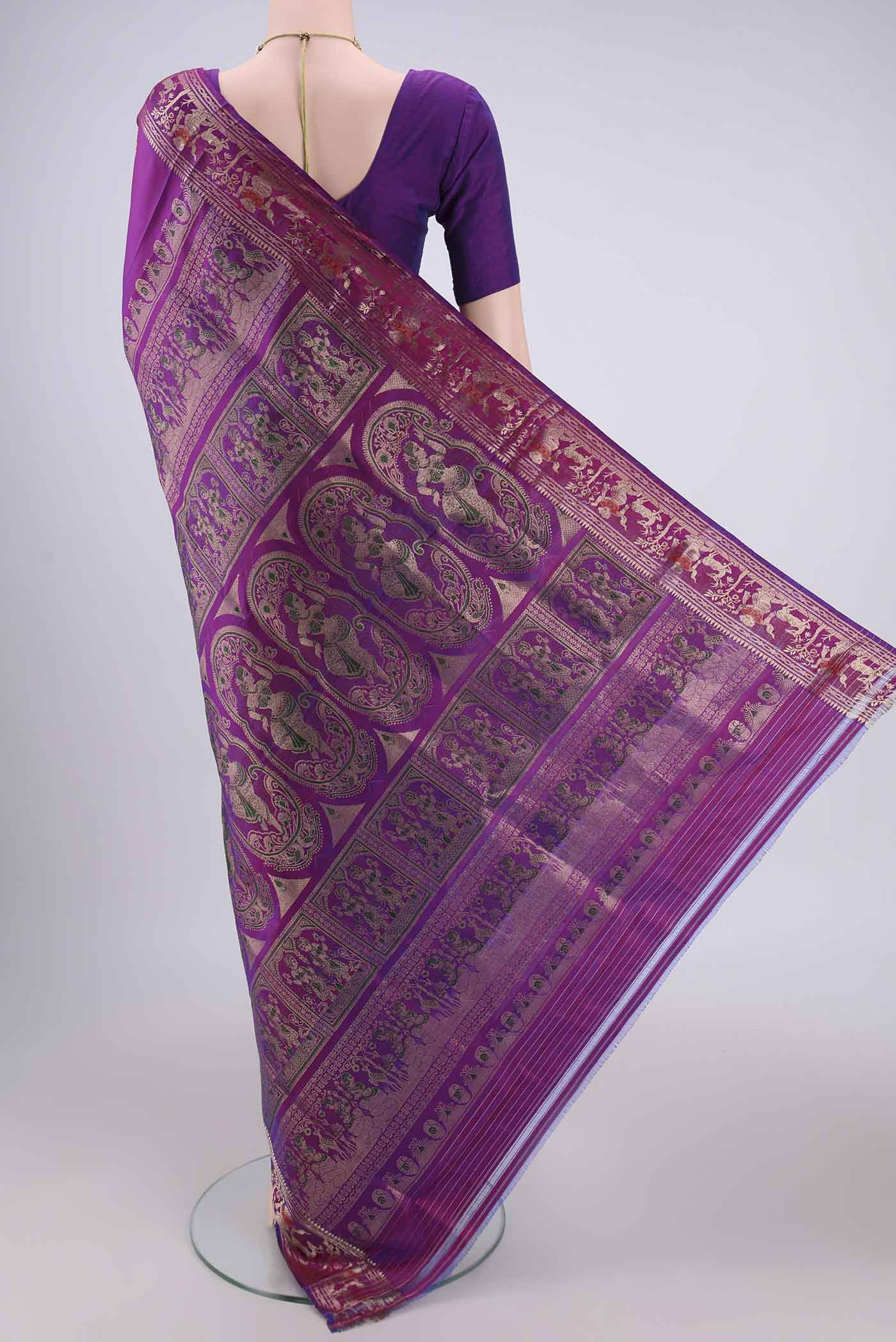 Flat view of Purple Baluchari Silk Saree with Zari And Thread Butta on the body and Zari And Thread Border. 
