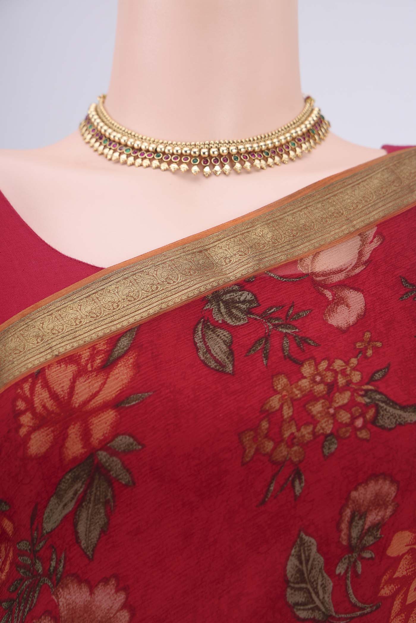 Border image of Red Mysore Chiffon Saree with Floral Print on the body and Zari Border. 