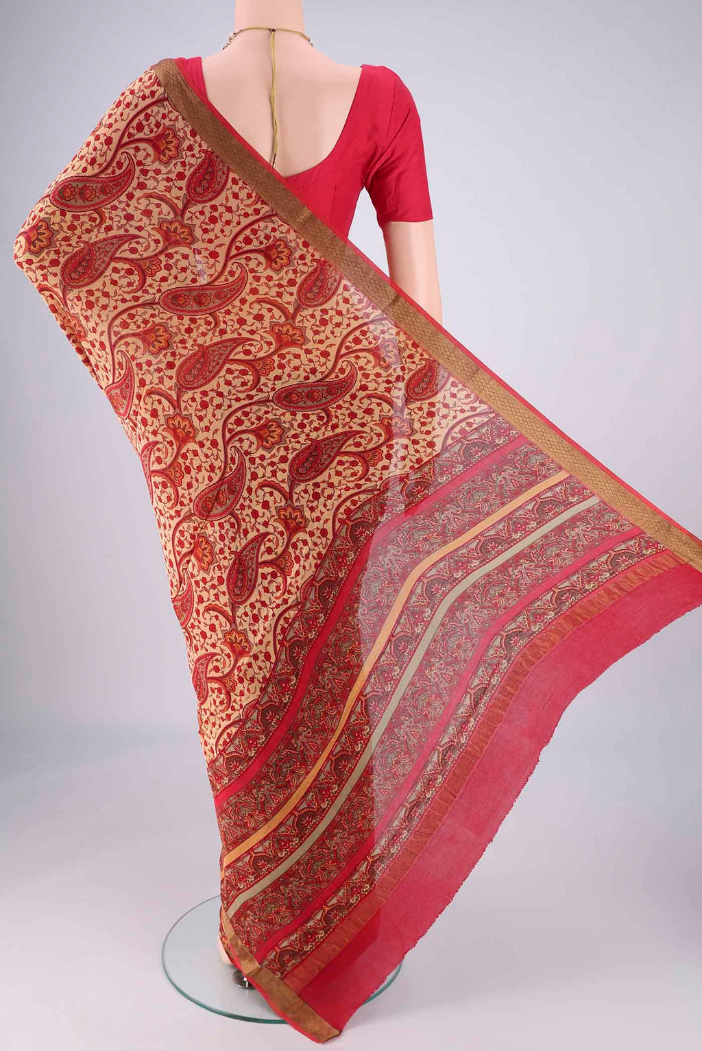 Flat view of Sandal Mysore Crepe Saree with Printed design on the body and Zari Border. 