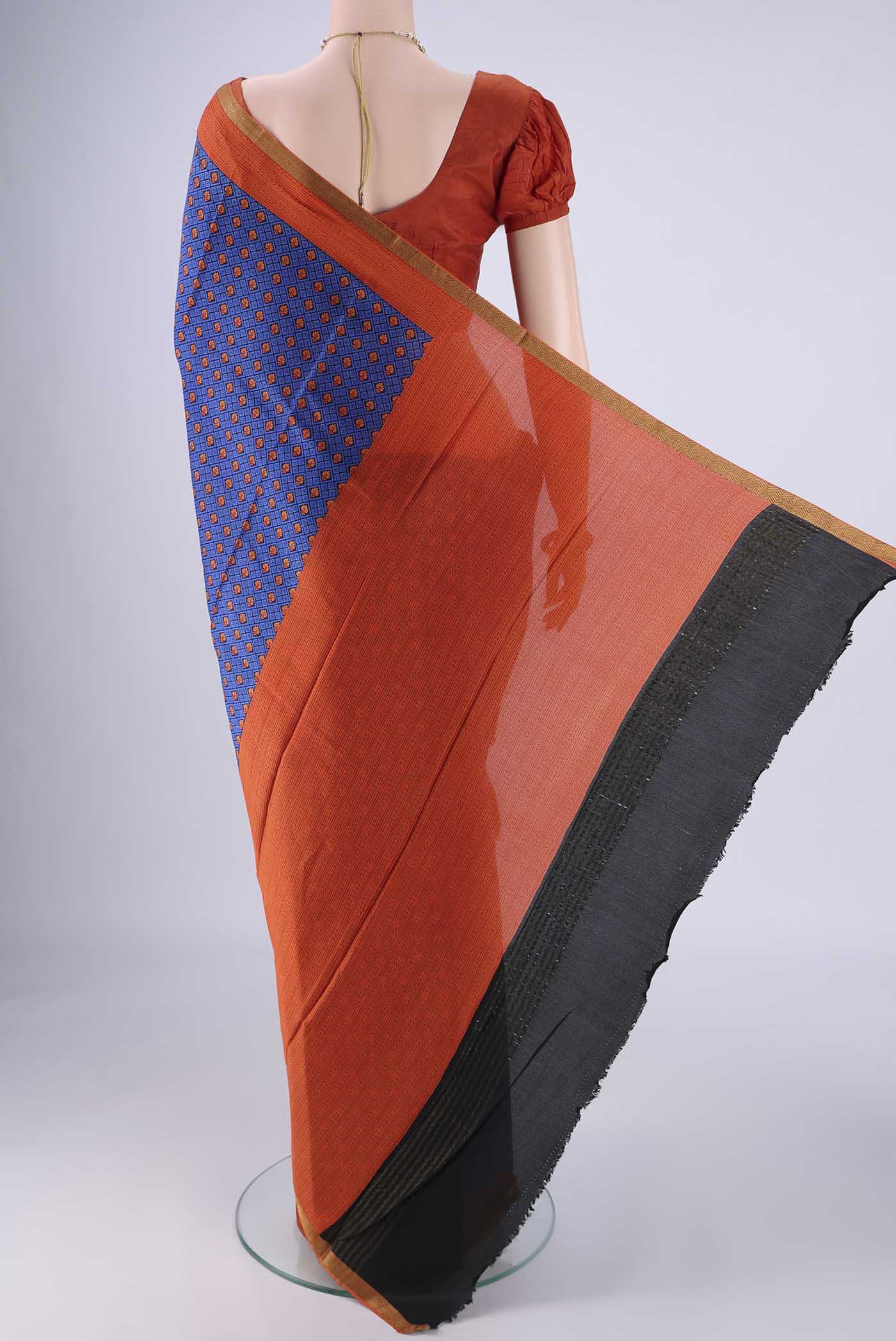 Flat view of Royal Blue Mysore Crepe Saree with Printed design on the body and Printed Border. 