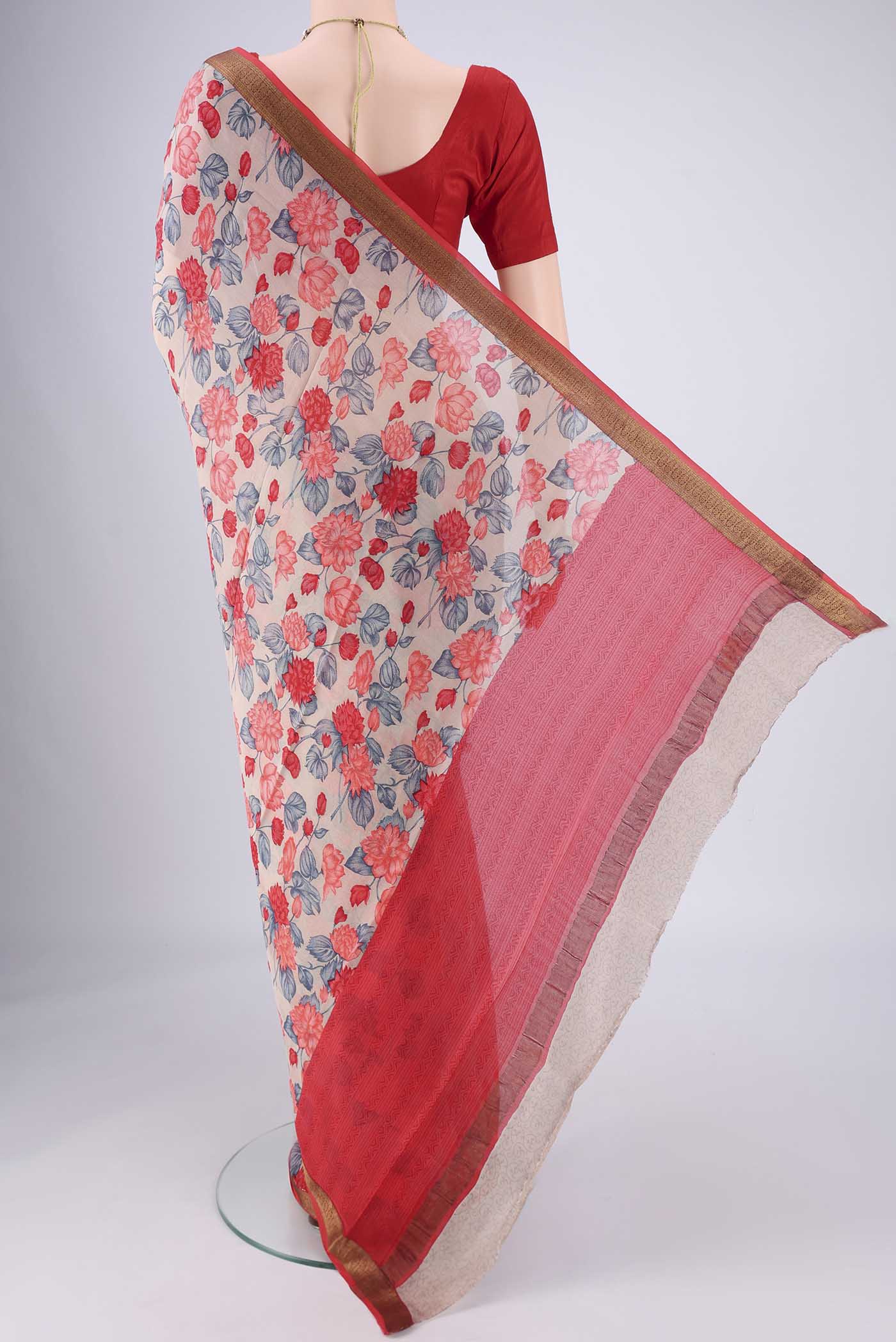 Flat view of Grey Mysore Crepe Saree with Printed design on the body and Zari Border. 