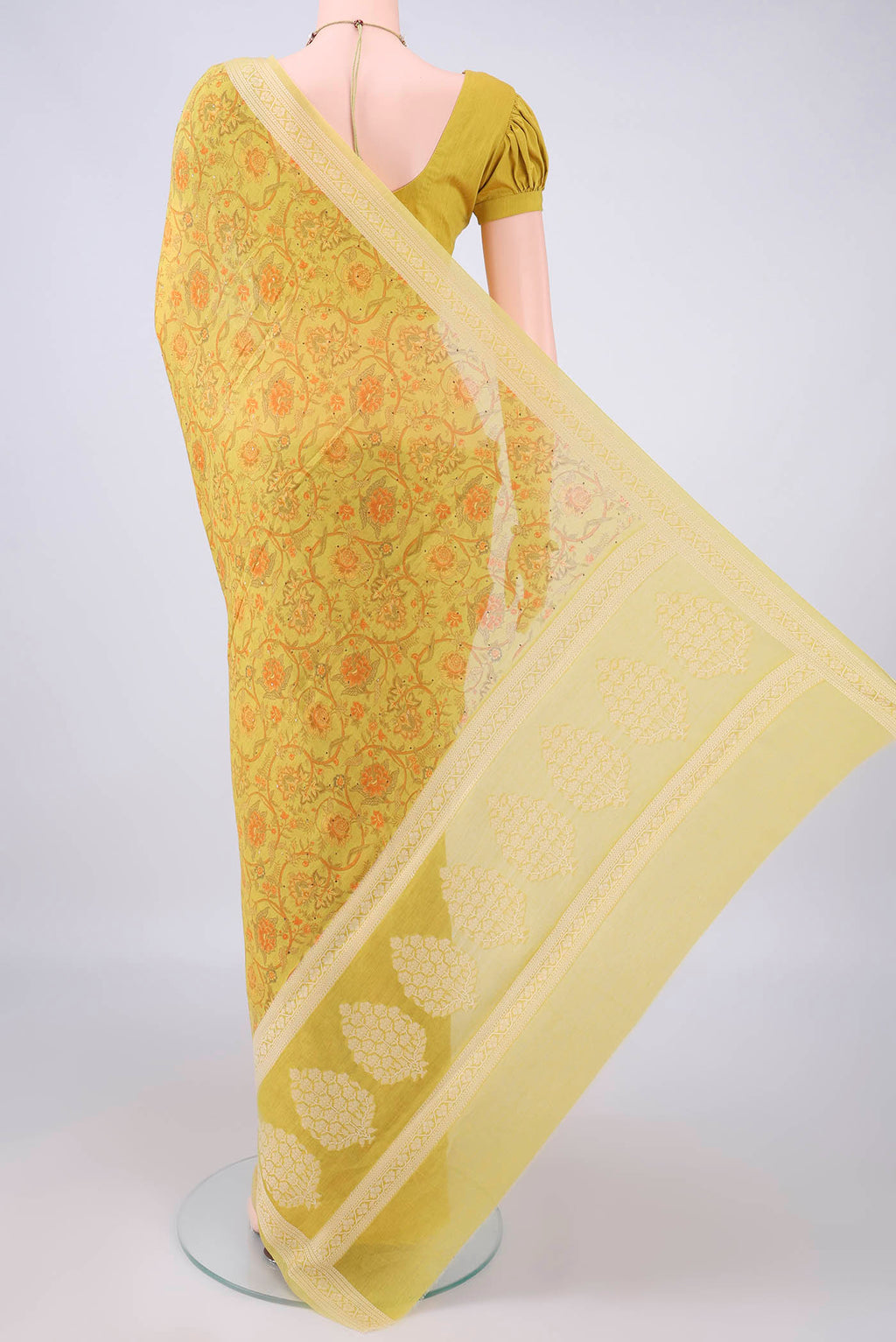 Flat view of Yellow Chanderi Cotton Saree with Printed design on the body and Thread Border. 