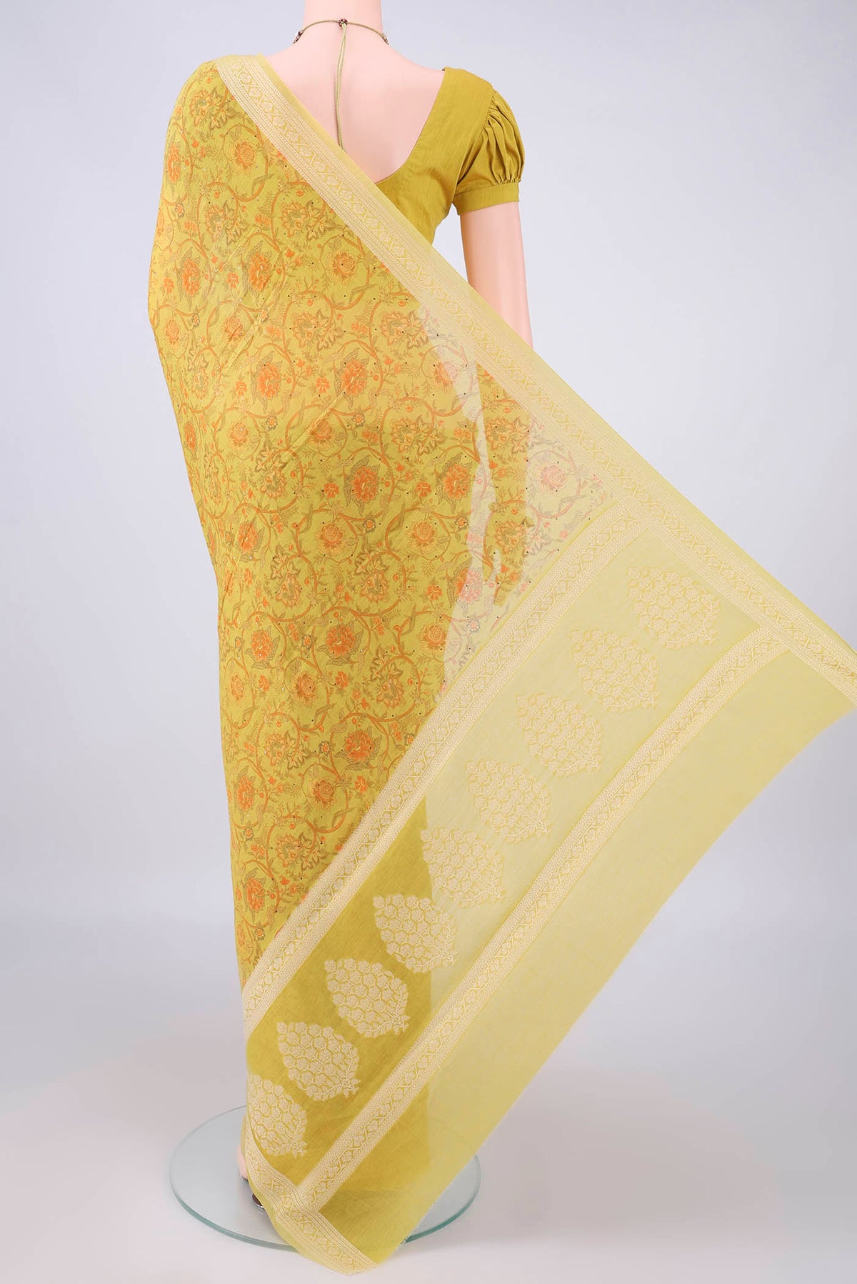 Flat view of Yellow Chanderi Cotton Saree with Printed design on the body and Thread Border. 