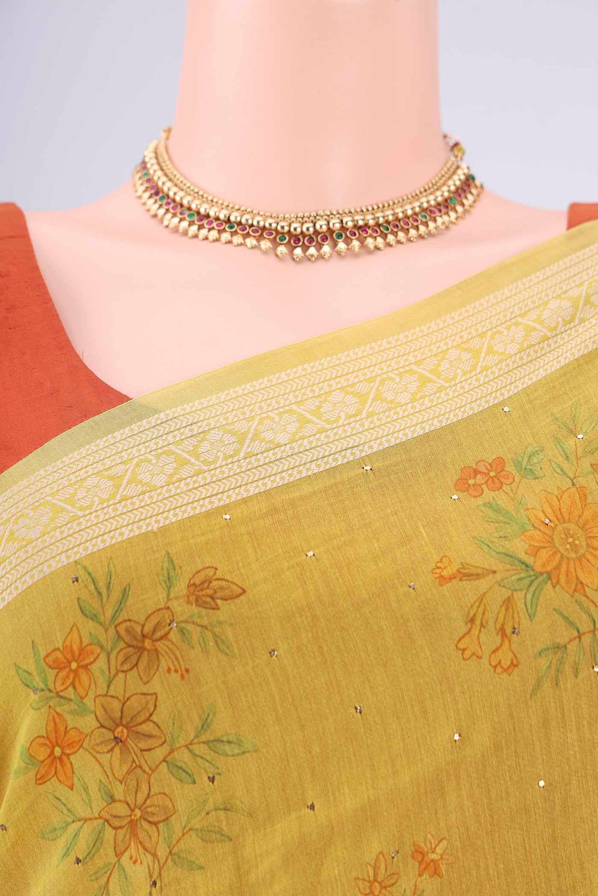 Border image of Acid Green Chanderi Silk Cotton Saree with Floral Print on the body and Zari Border. 
