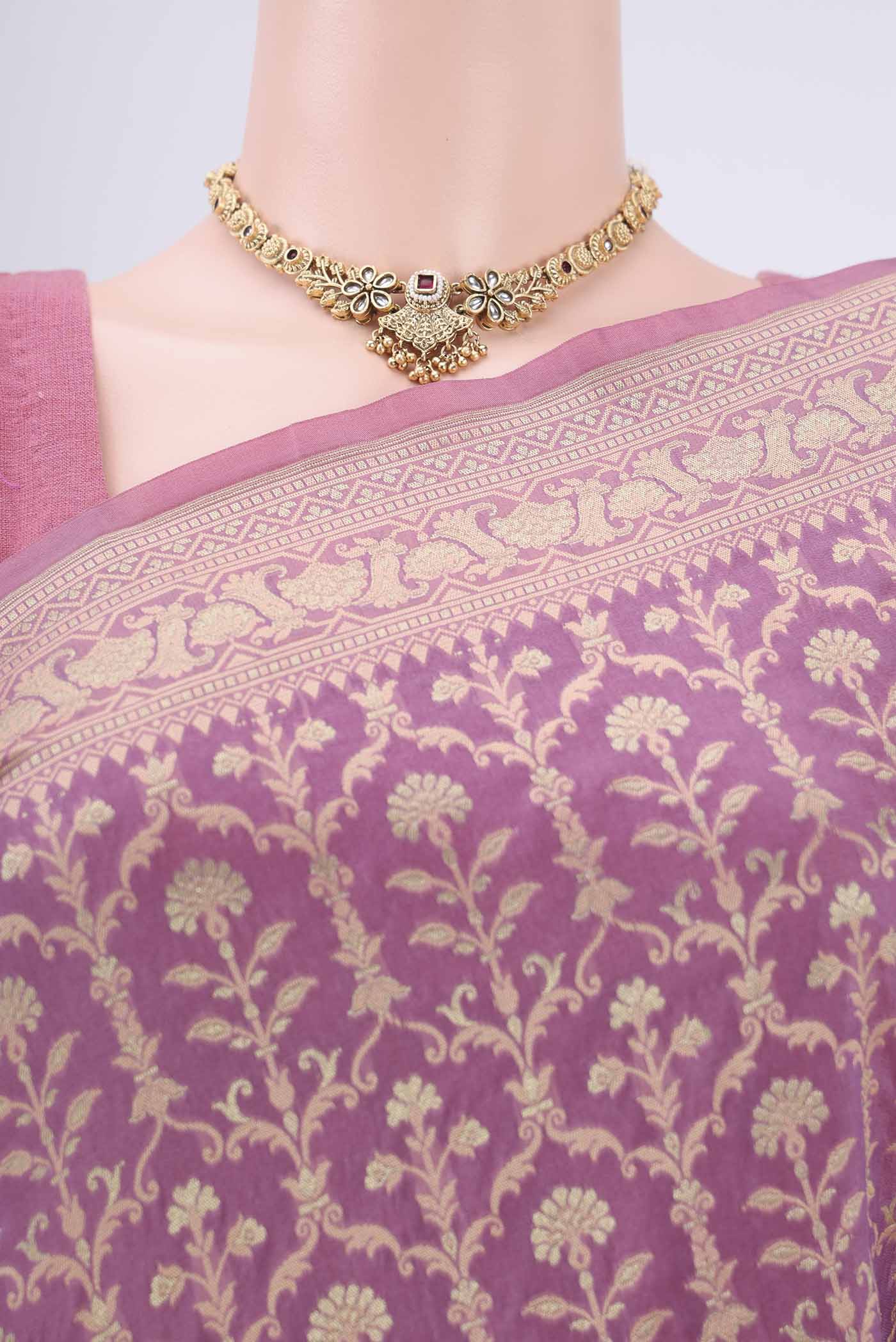 Border image of Purple Banarasi Silk Saree with Zari And Thread Butta on the body and Zari Border. 