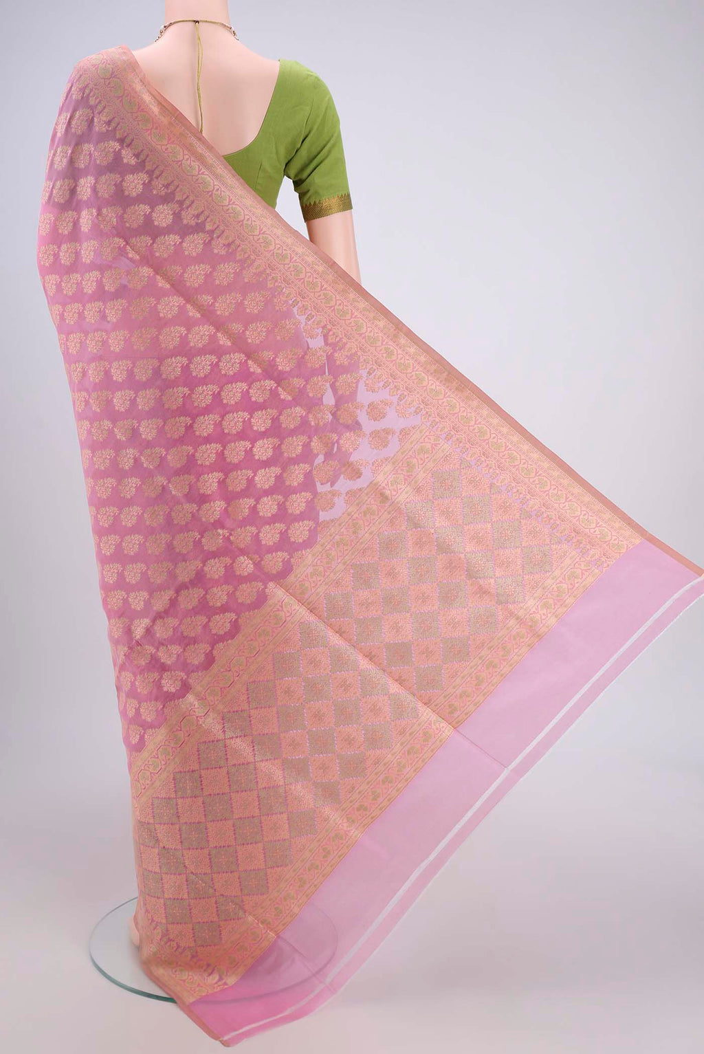 Flat view of Rose pink Banarasi Silk Saree with Zari And Thread Butta on the body and Zari Border. 