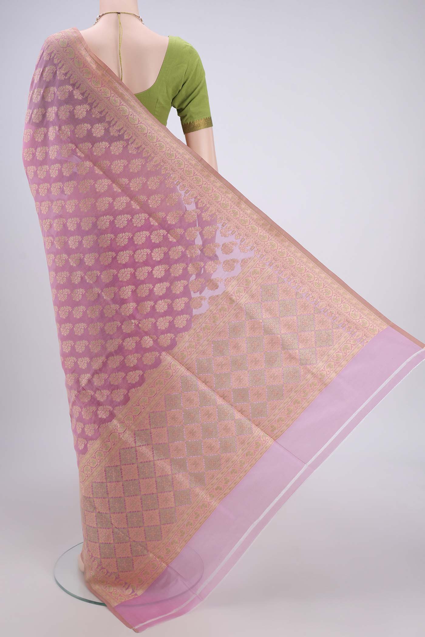Flat view of Rose pink Banarasi Silk Saree with Zari And Thread Butta on the body and Zari Border. 