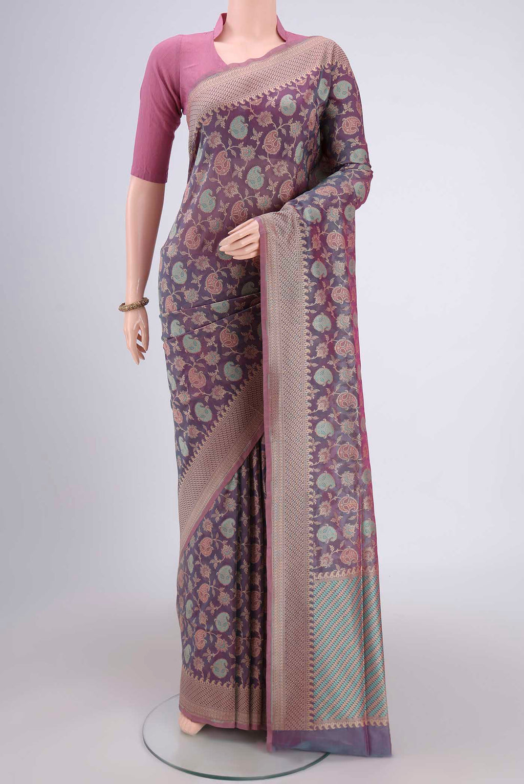 Light Magenta Dual Tone Banarasi Silk Saree with Thread Brocade on the body and Thread Border.  displayed on a mannequin