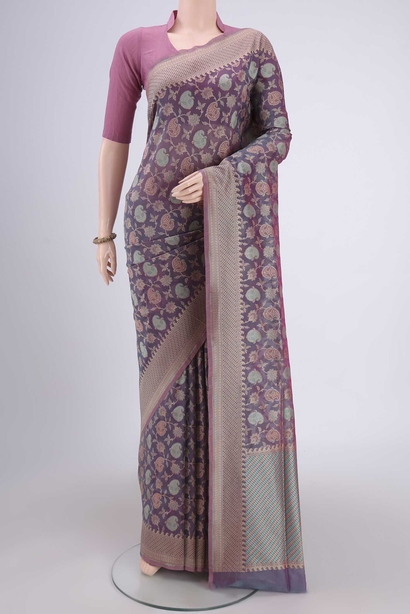 Light Magenta Dual Tone Banarasi Silk Saree with Thread Brocade on the body and Thread Border.  displayed on a mannequin