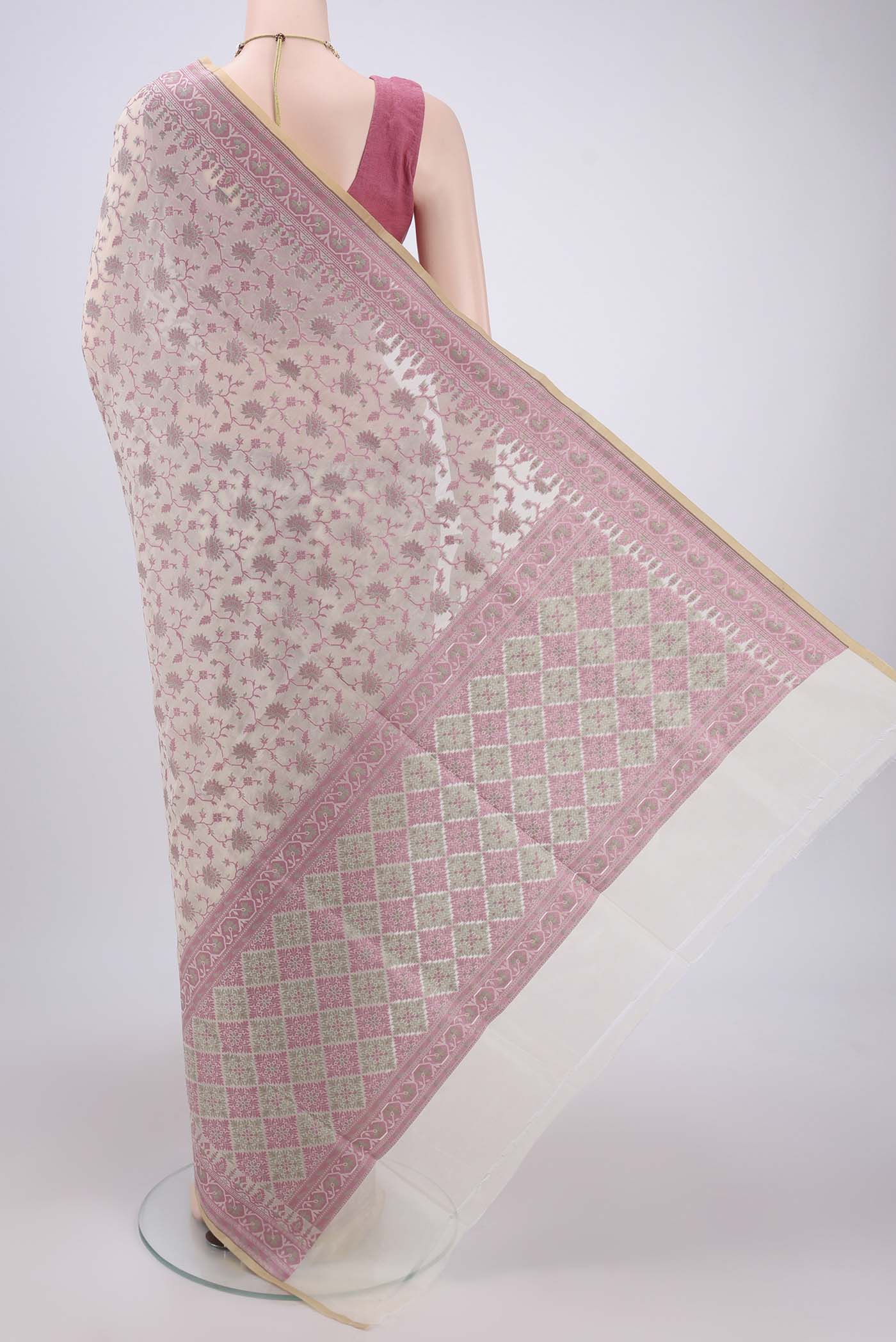 Flat view of Off White Banarasi Silk Saree with Thread Butta on the body and Zari Border. 
