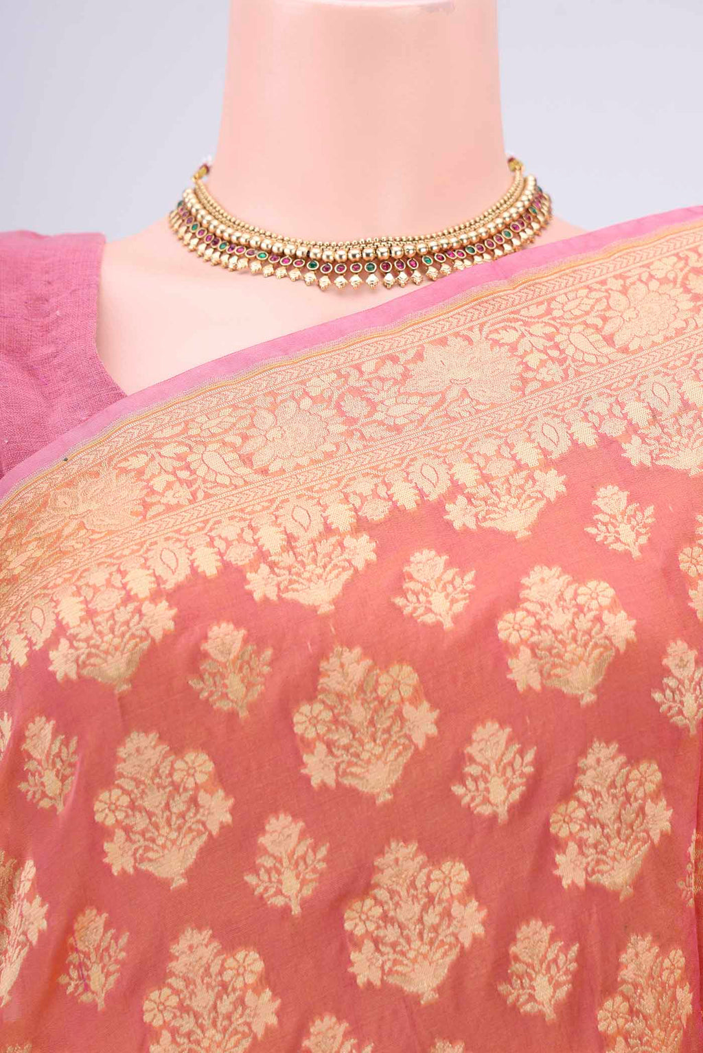 Border image of Brick Orange Dual Tone Banarasi Silk Saree with Zari Butta on the body and Zari Border. 
