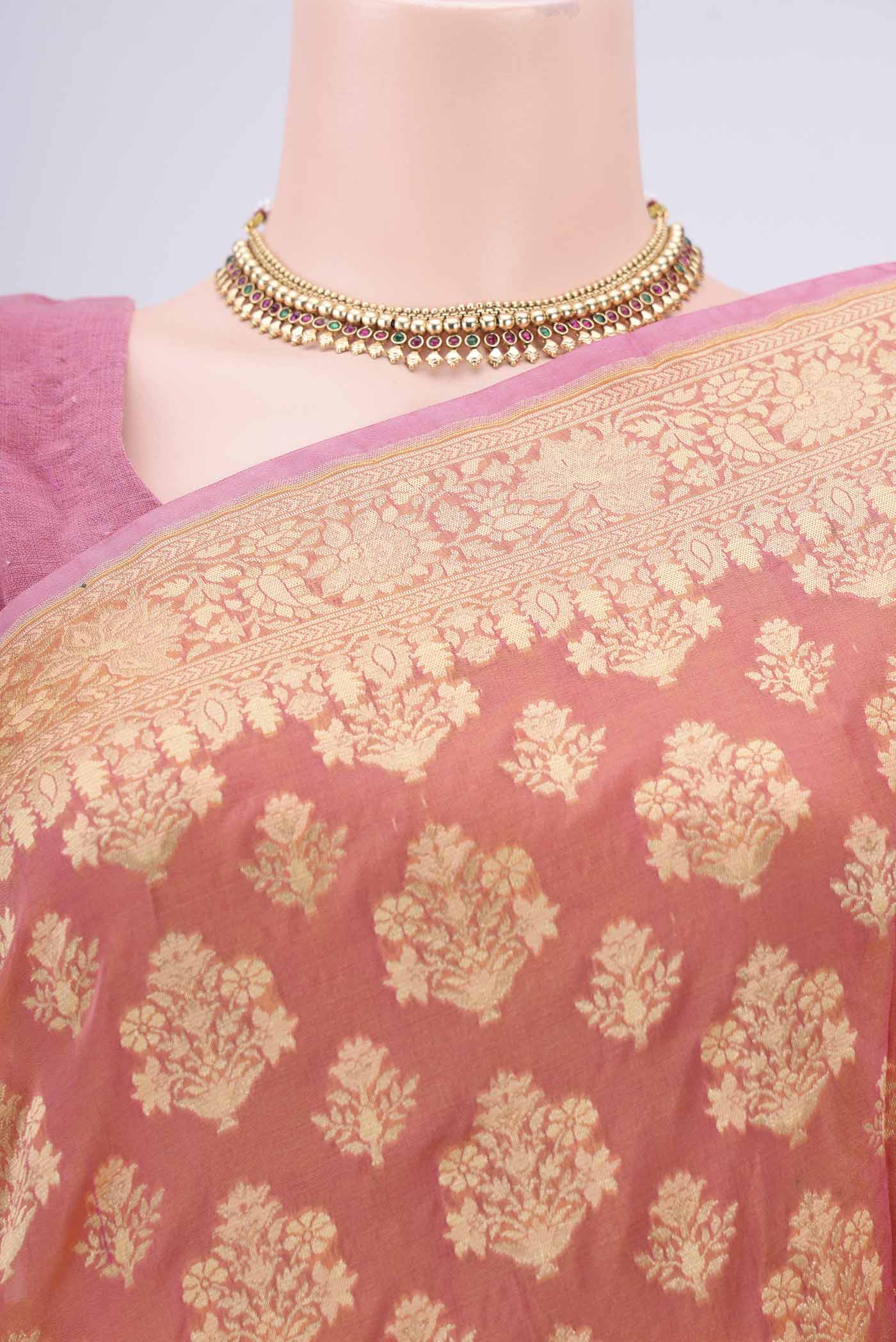 Border image of Brick Orange Dual Tone Banarasi Silk Saree with Zari Butta on the body and Zari Border. 