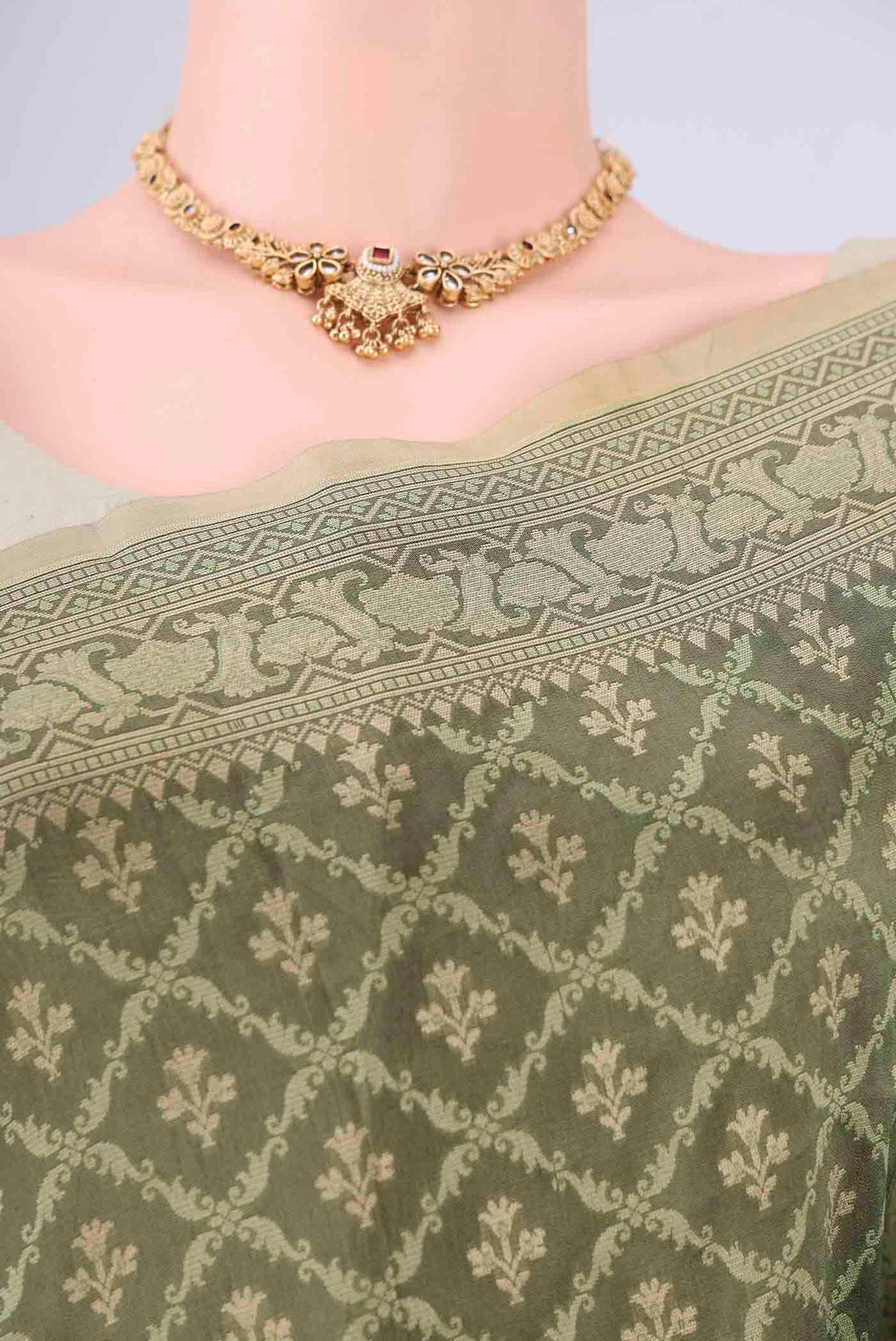 Border image of Olive Green Banarasi Silk Saree with Jacquard With Zari Butta on the body and Zari Border. 
